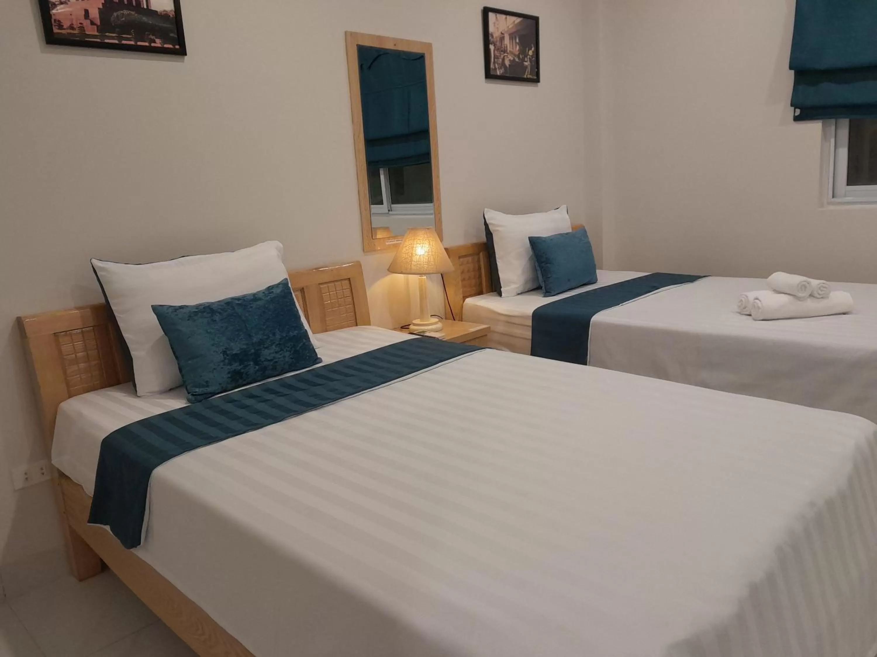 Bed in Hanoi Holiday Hotel