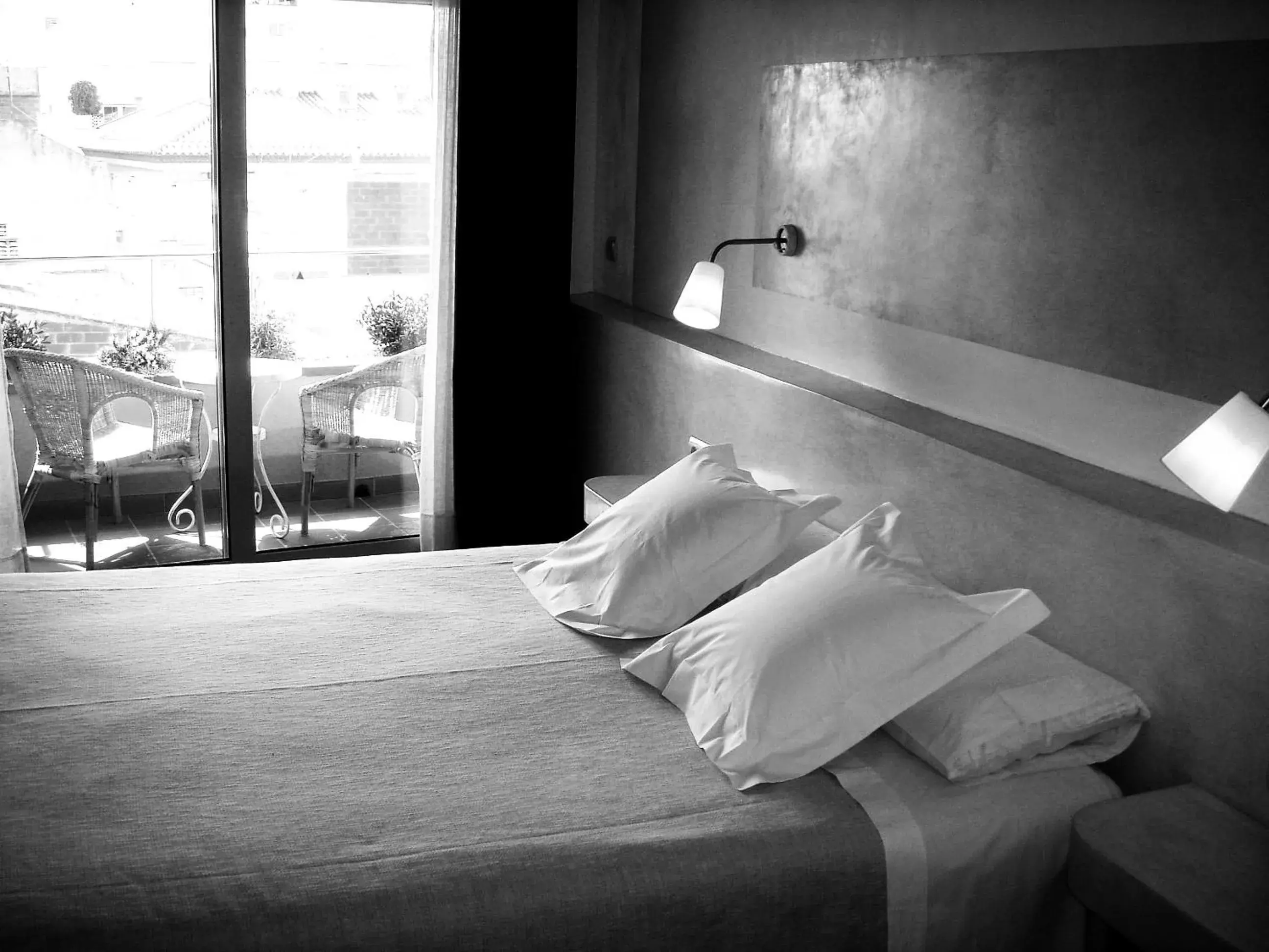 Bed in Hotel Carmen