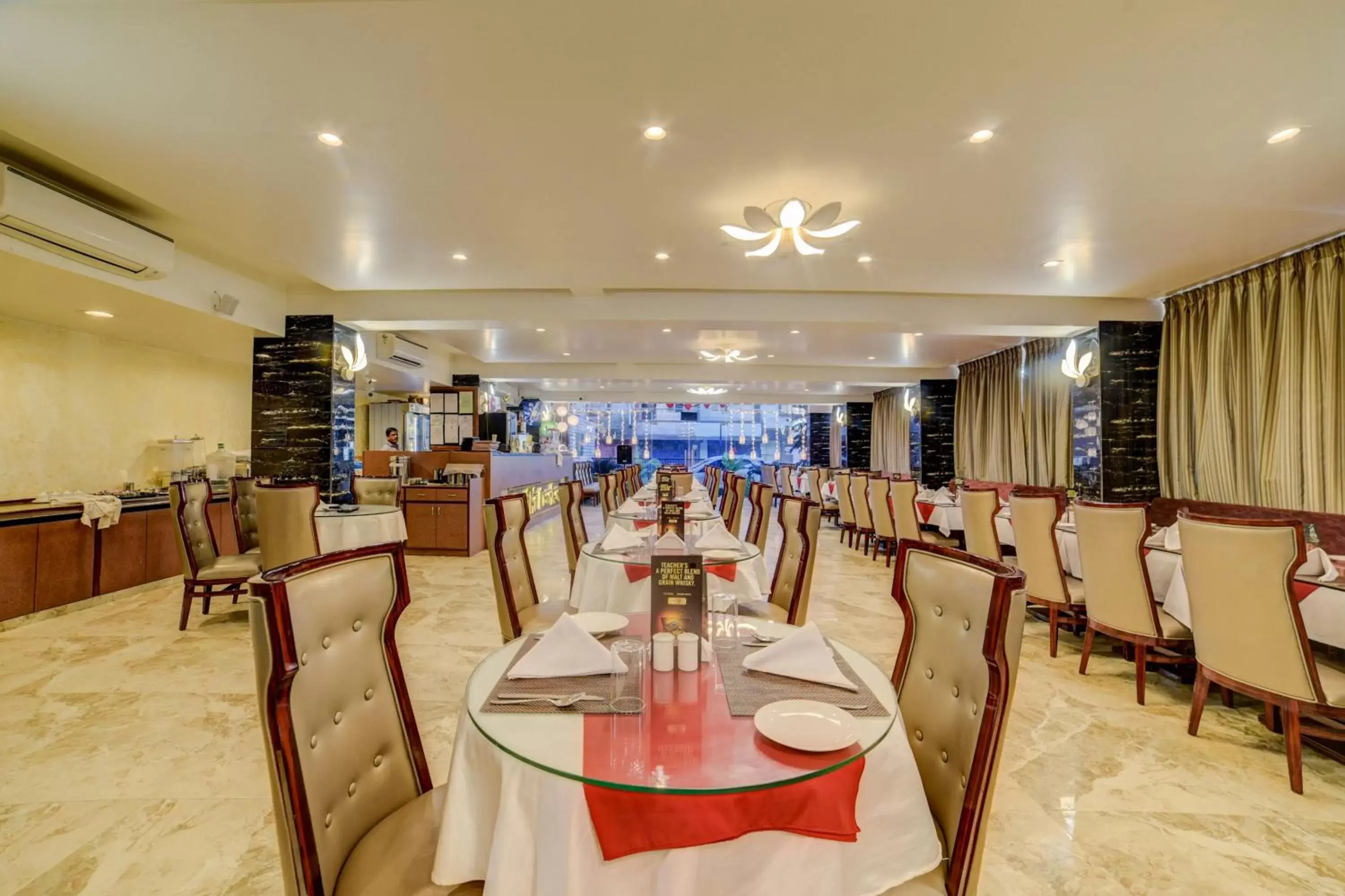 Restaurant/Places to Eat in FabHotel Prime Sarala Crown With Pool, Calangute Beach