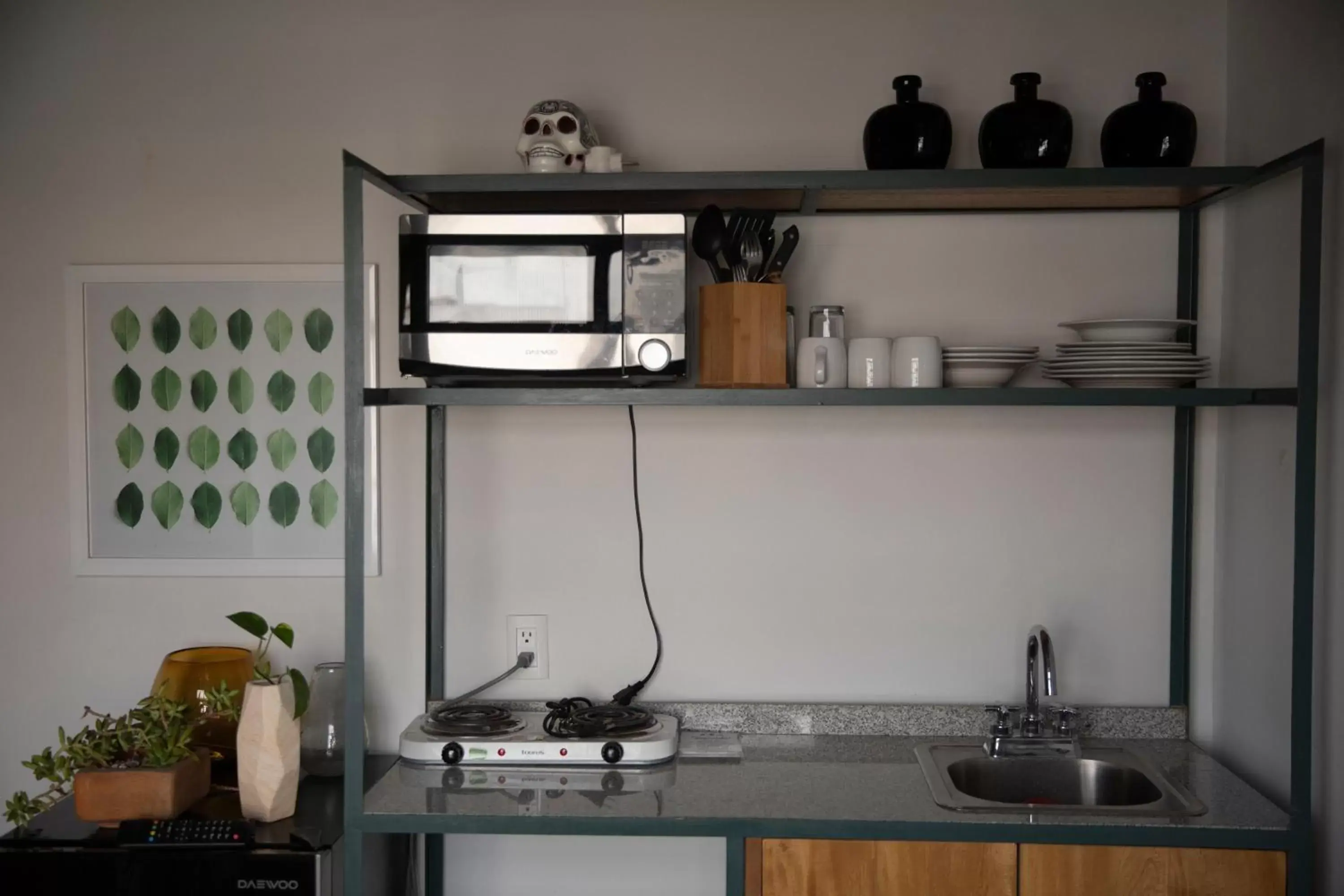 Kitchen/Kitchenette in Casa Nican by Barrio Mexico