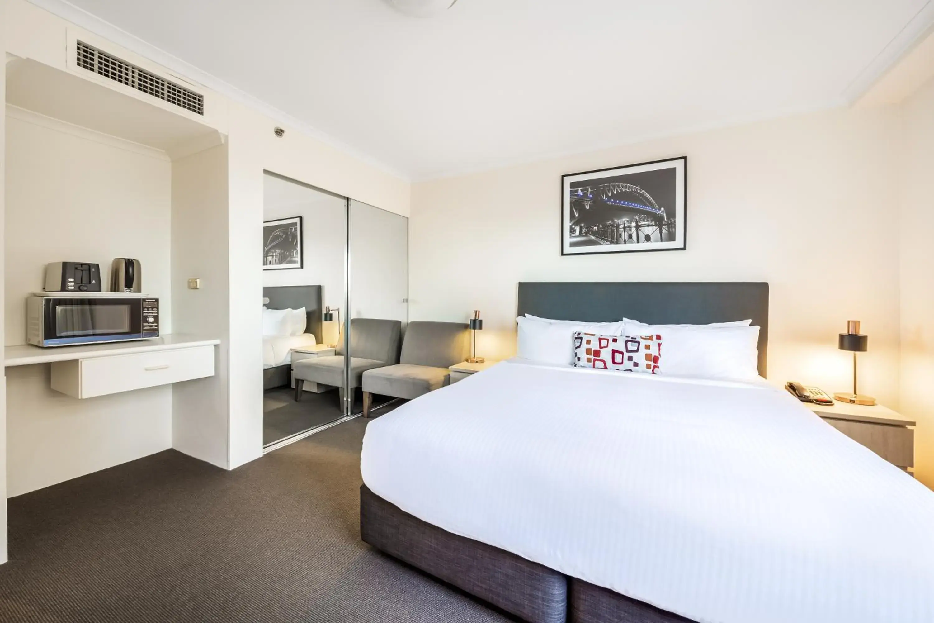 Bed in Oaks Sydney Castlereagh Suites