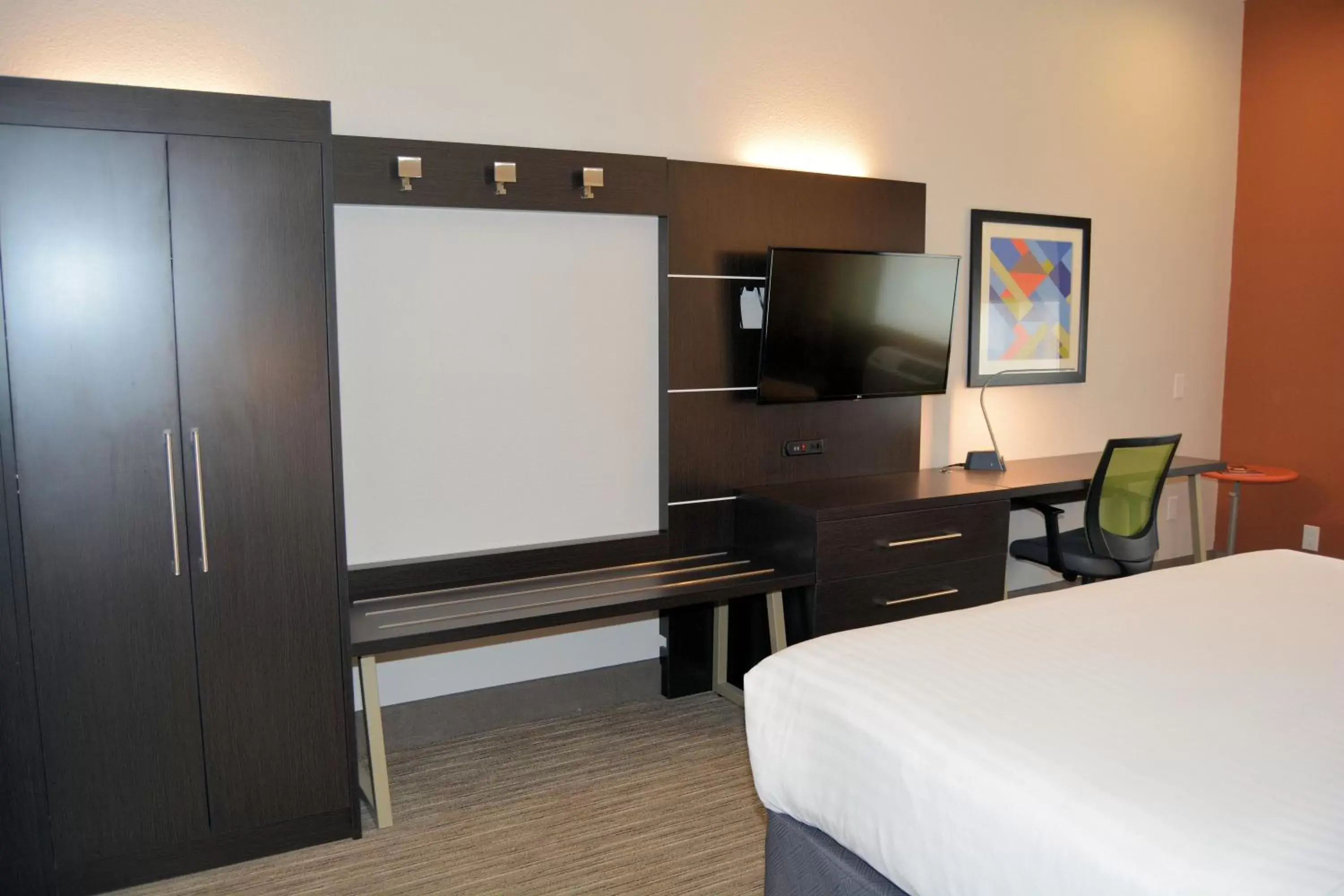 Photo of the whole room, TV/Entertainment Center in Holiday Inn Express Hotel and Suites Abilene, an IHG Hotel