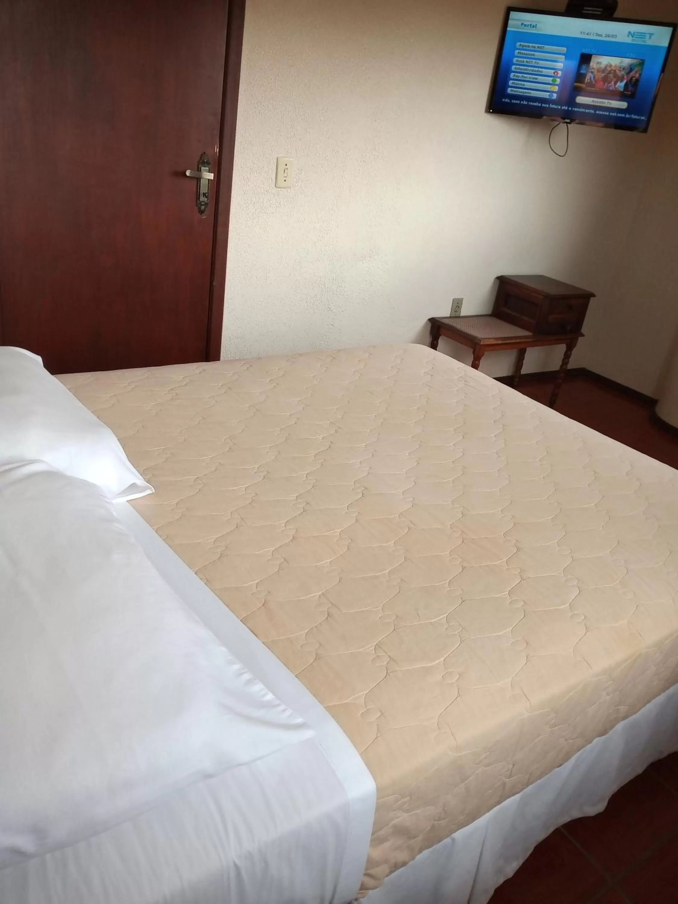 Bed in Pousada Japeju