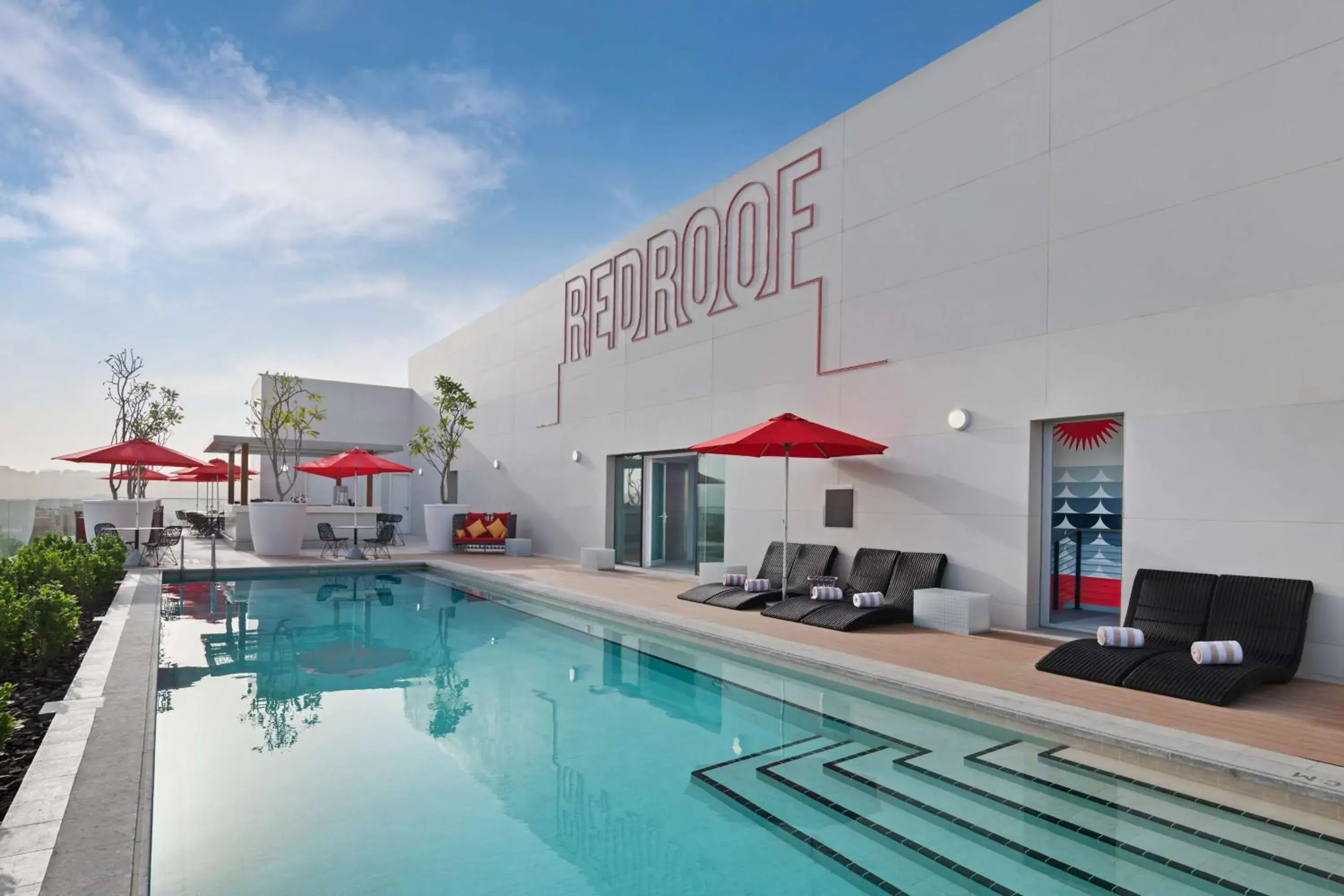 Pool view, Swimming Pool in Radisson RED Dubai Silicon Oasis
