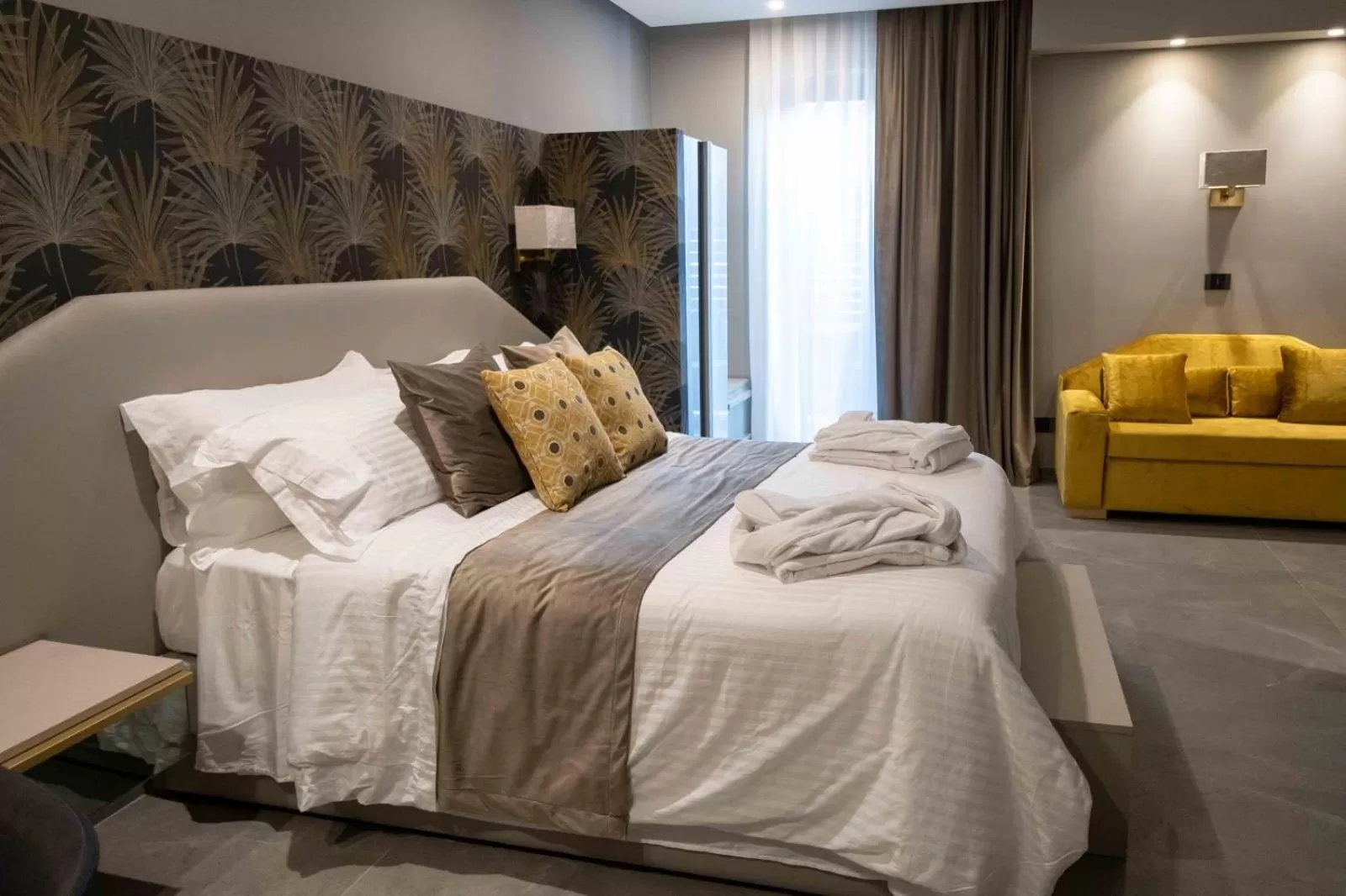 Photo of the whole room, Bed in Divina Charme