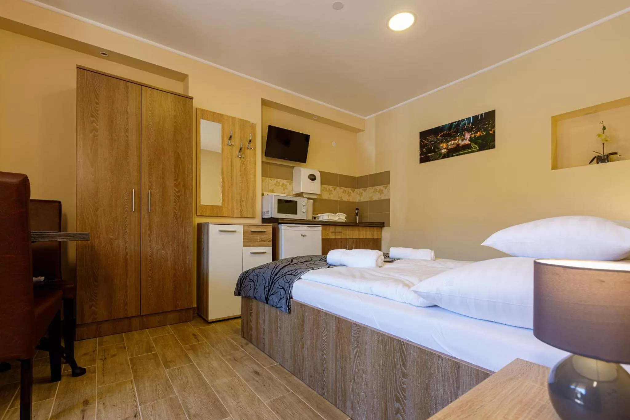 Bed in Central Panzió Gyula