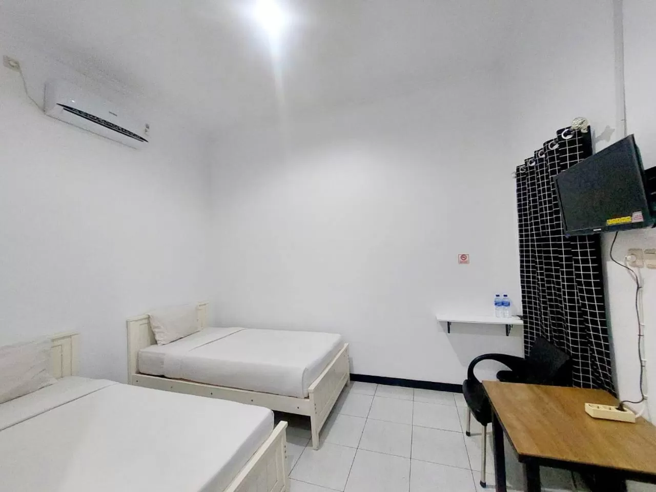 Bed in COZY STAY KUPANG