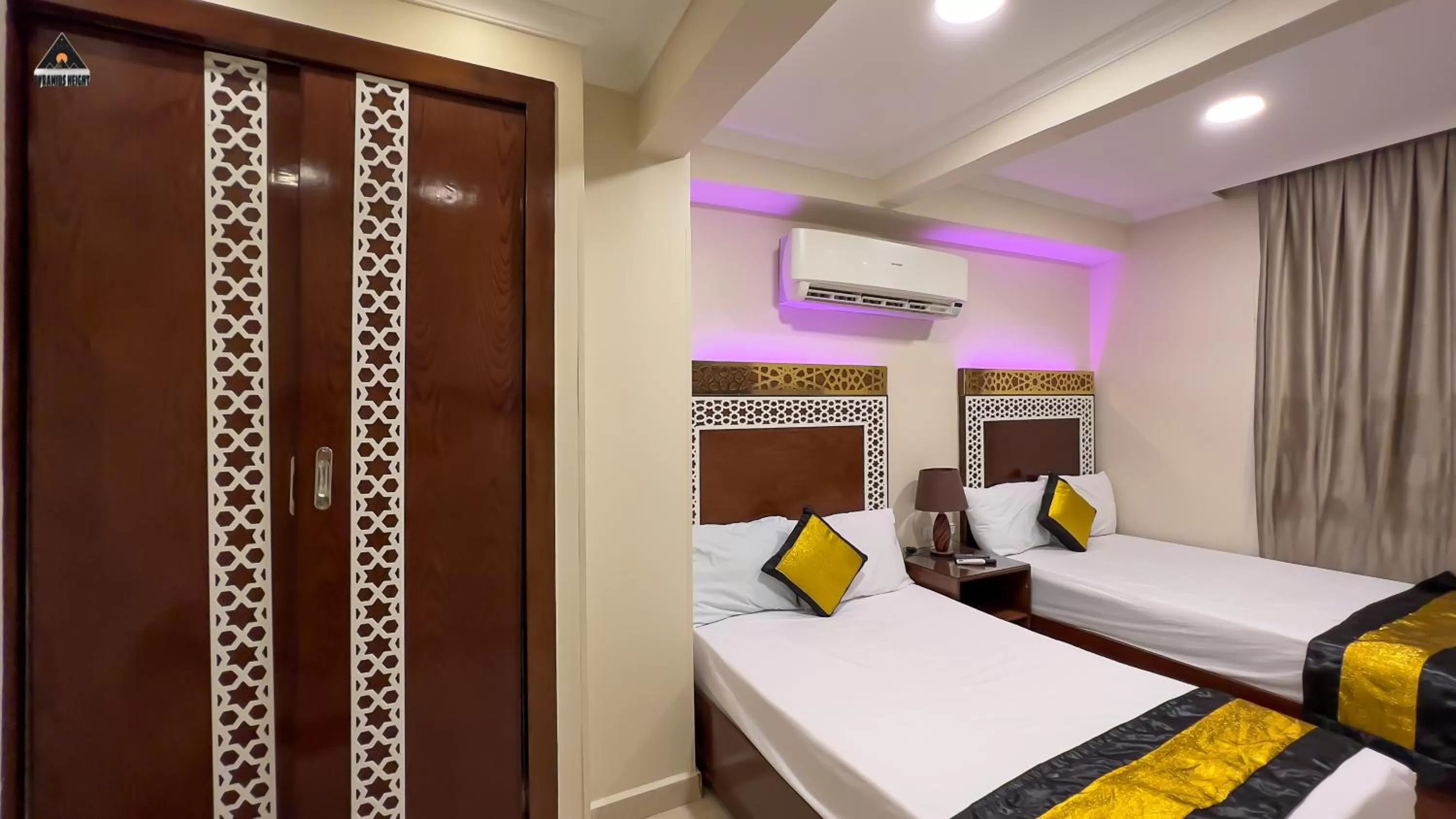 Bed in Pyramids Height Hotel & Pyramids Master Scene Rooftop