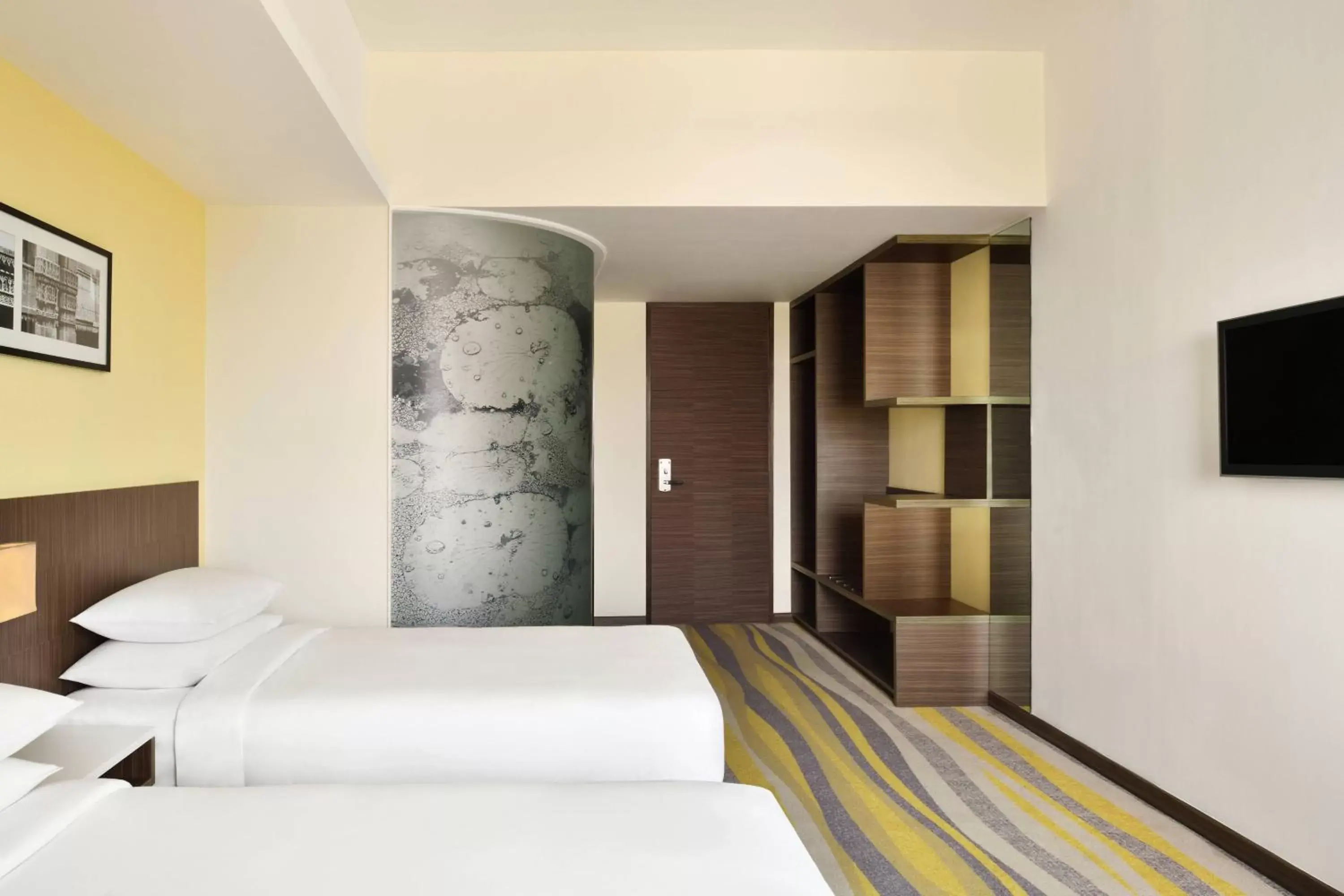 Photo of the whole room, Bed in Fairfield by Marriott Ahmedabad