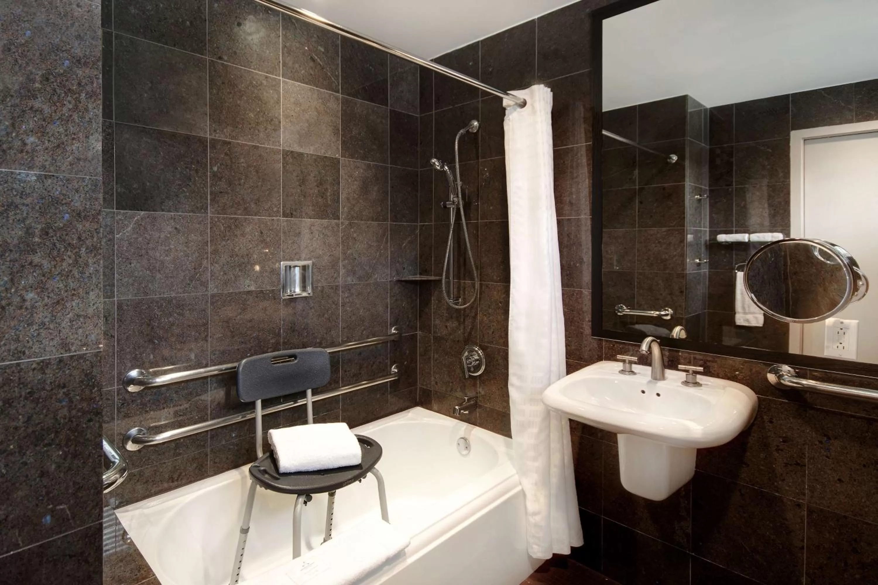 Shower in The Sam Houston, Tapestry Collection by Hilton