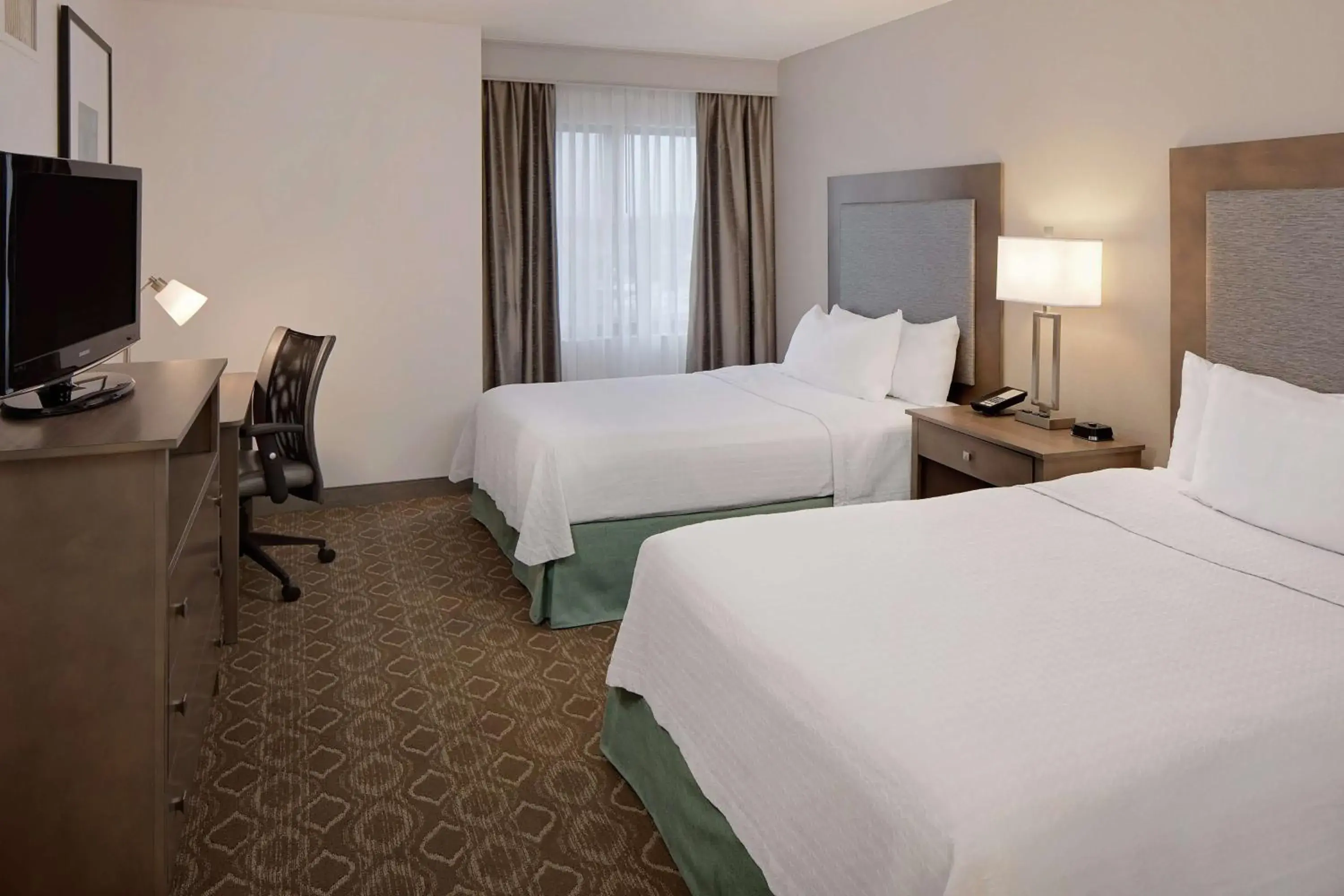 Bed in Homewood Suites by Hilton Minneapolis-Mall Of America