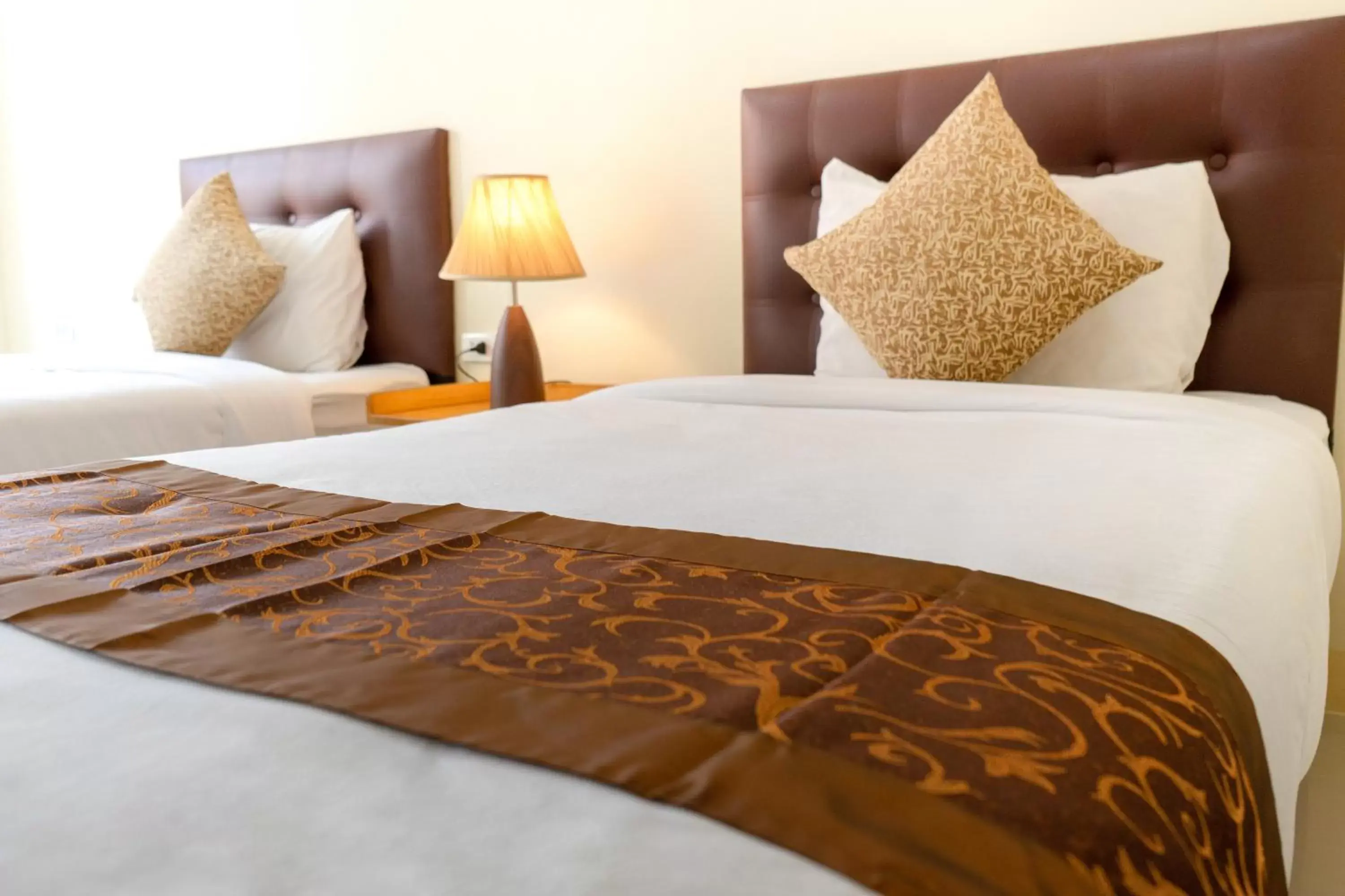 Bed in Sasi Nonthaburi Hotel