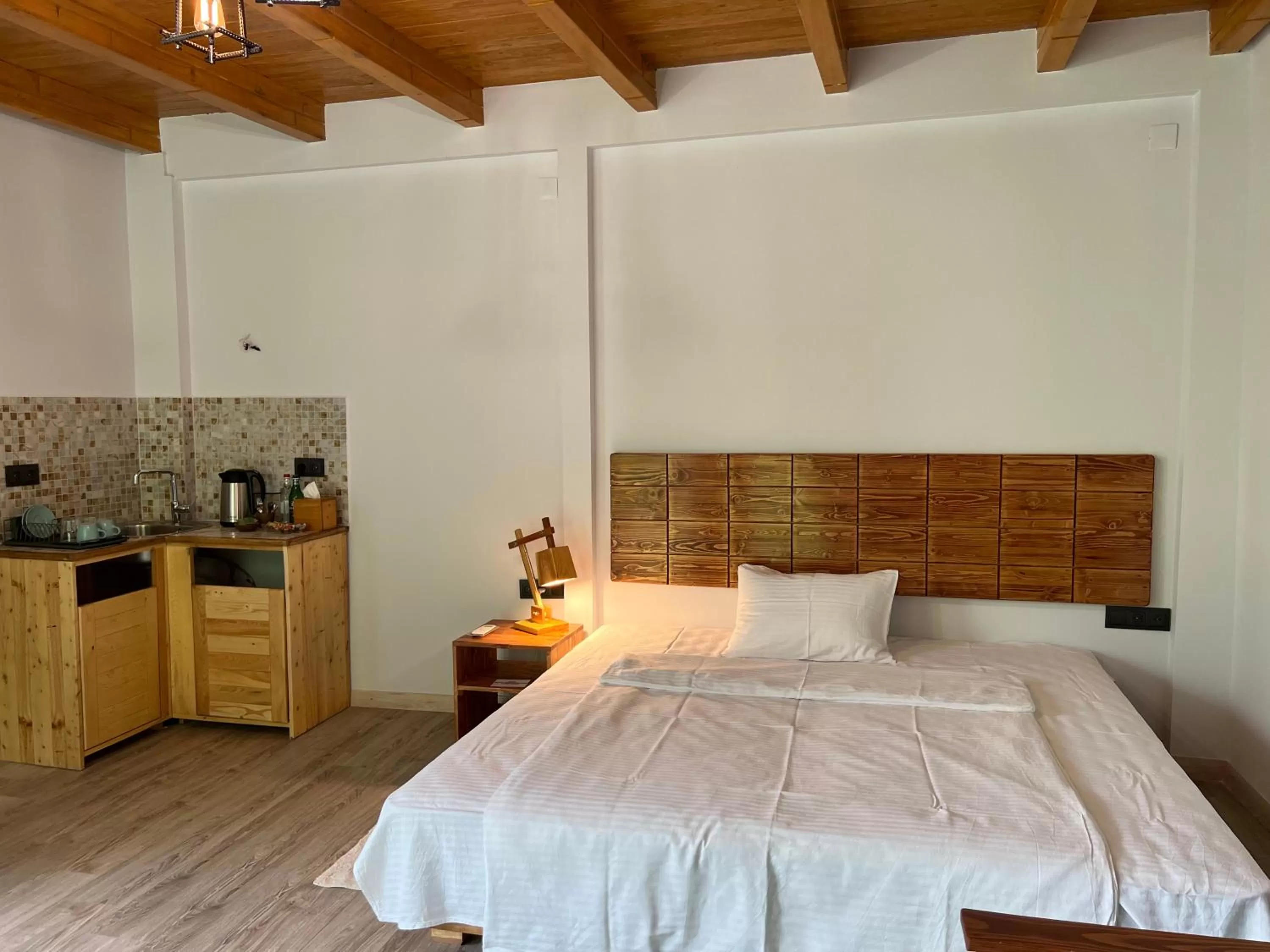 Bed in Green Stone Boutique Hotel