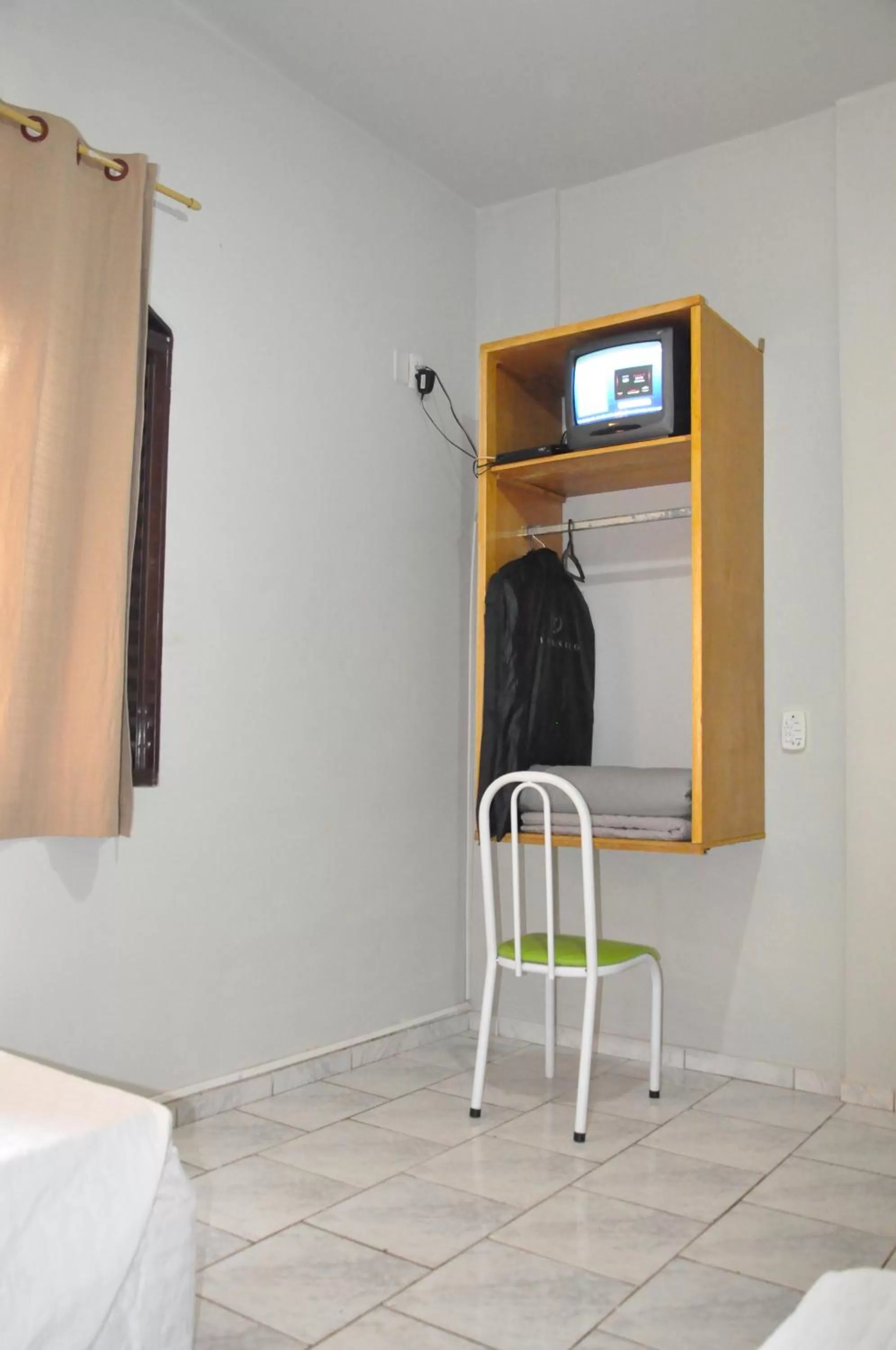 Bed in Hotel Caçula