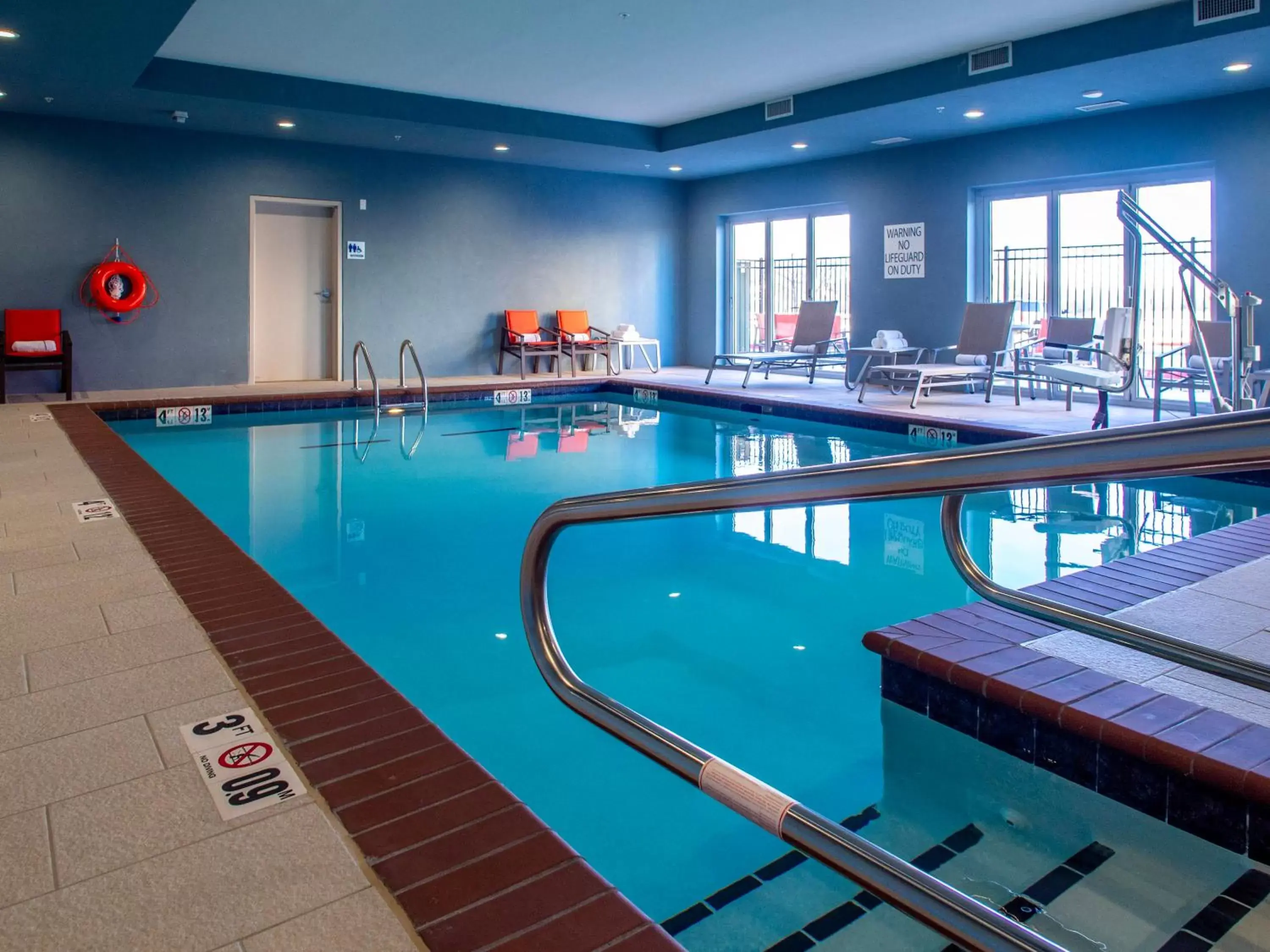 Swimming Pool in Holiday Inn Express & Suites - Oklahoma City Airport, an IHG Hotel