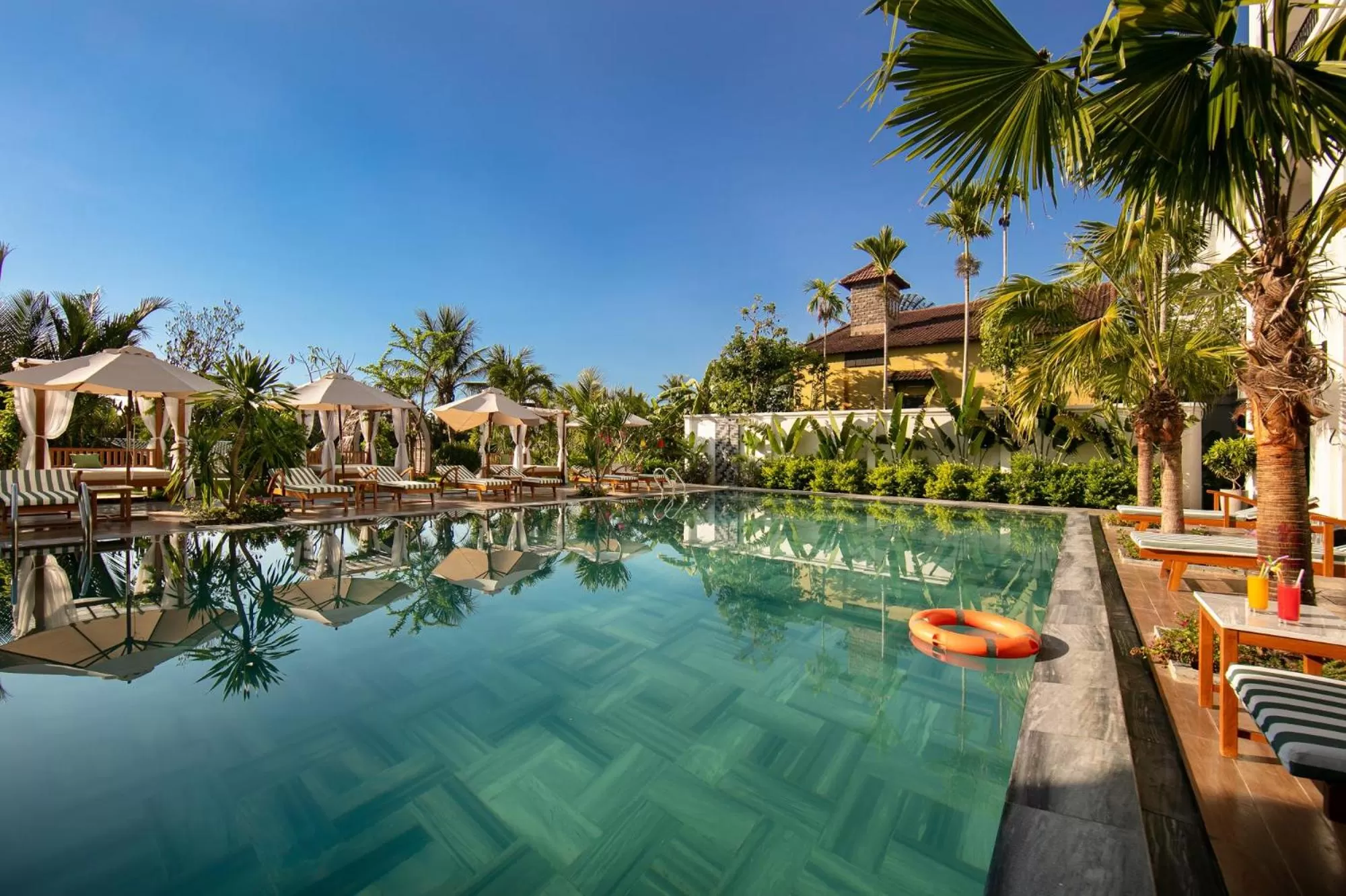 Swimming pool in Shining Riverside Hoi An Boutique & Spa
