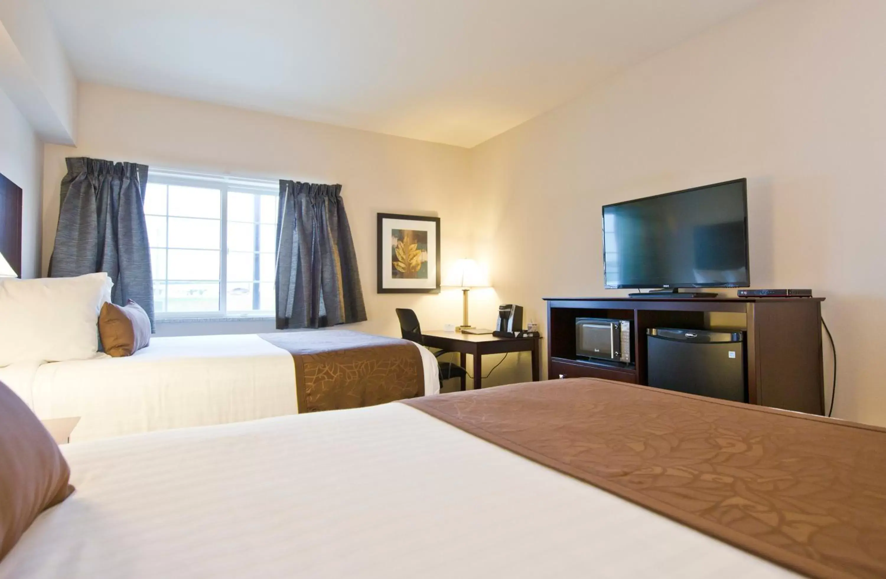 Bed in Cobblestone Inn & Suites - Boone