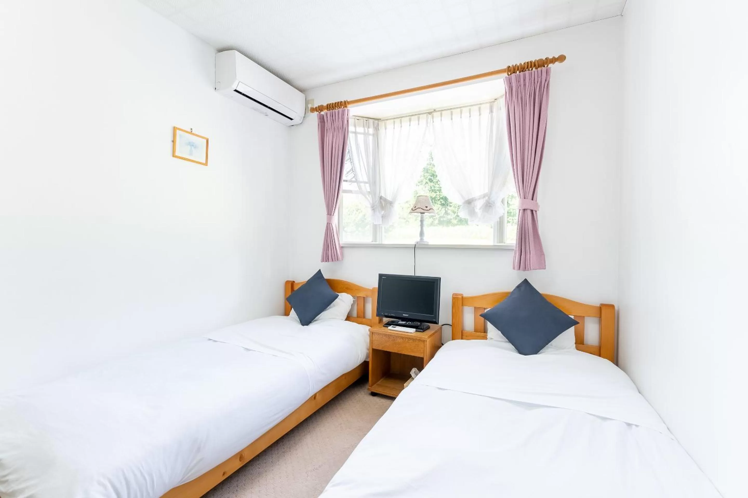 Photo of the whole room, Bed in Tabist Kiyosato Grandeur Yatsugatake