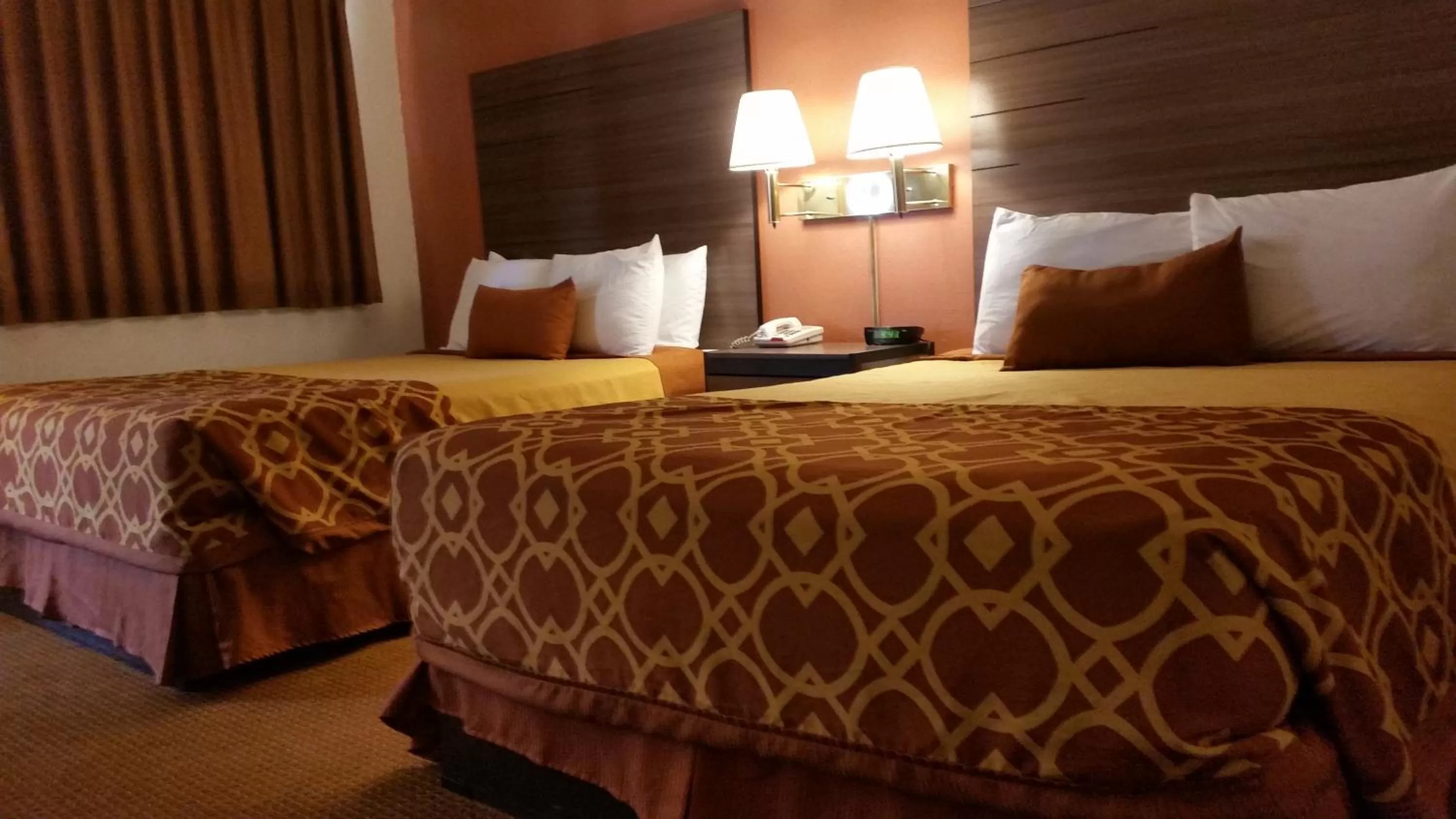 Bed in American Inn Of Liberal