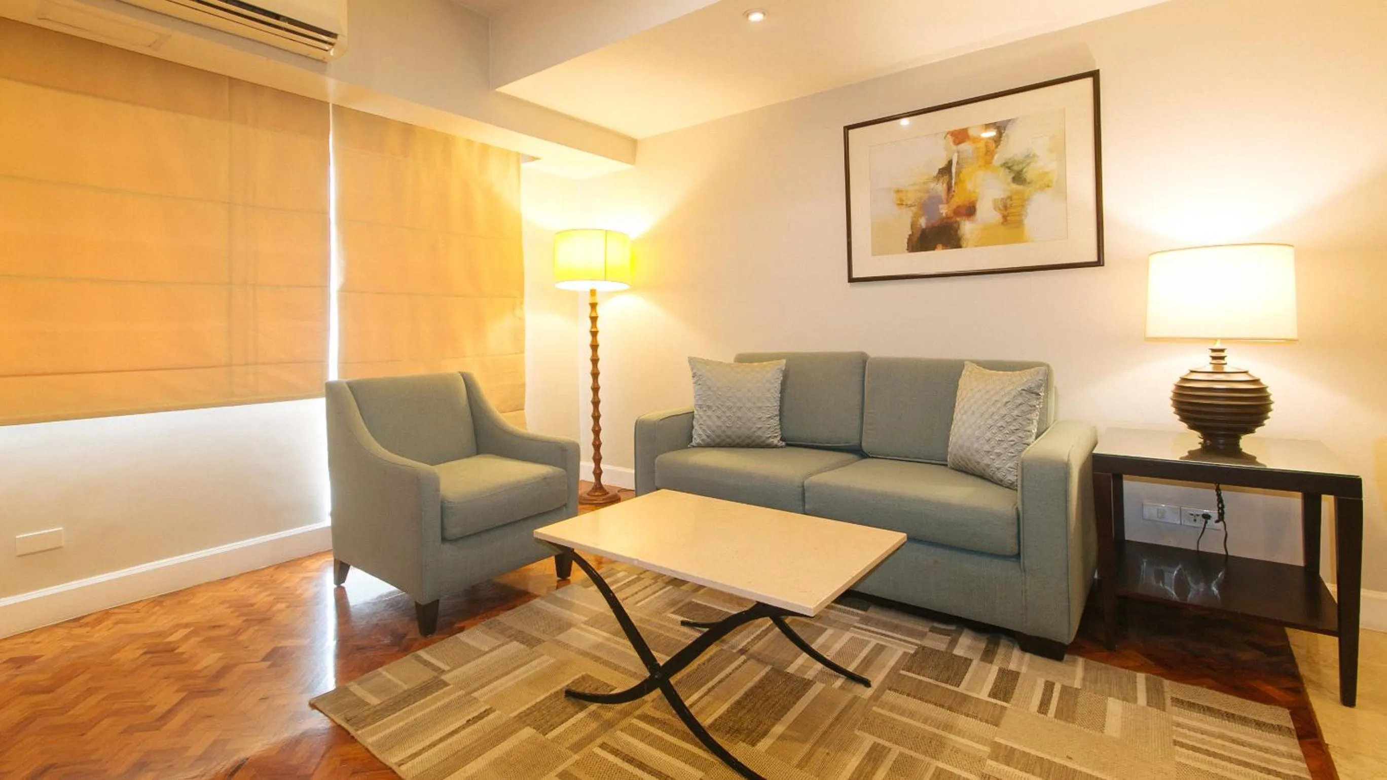 Living room in RedDoorz Premium at The Residences Olympia Makati