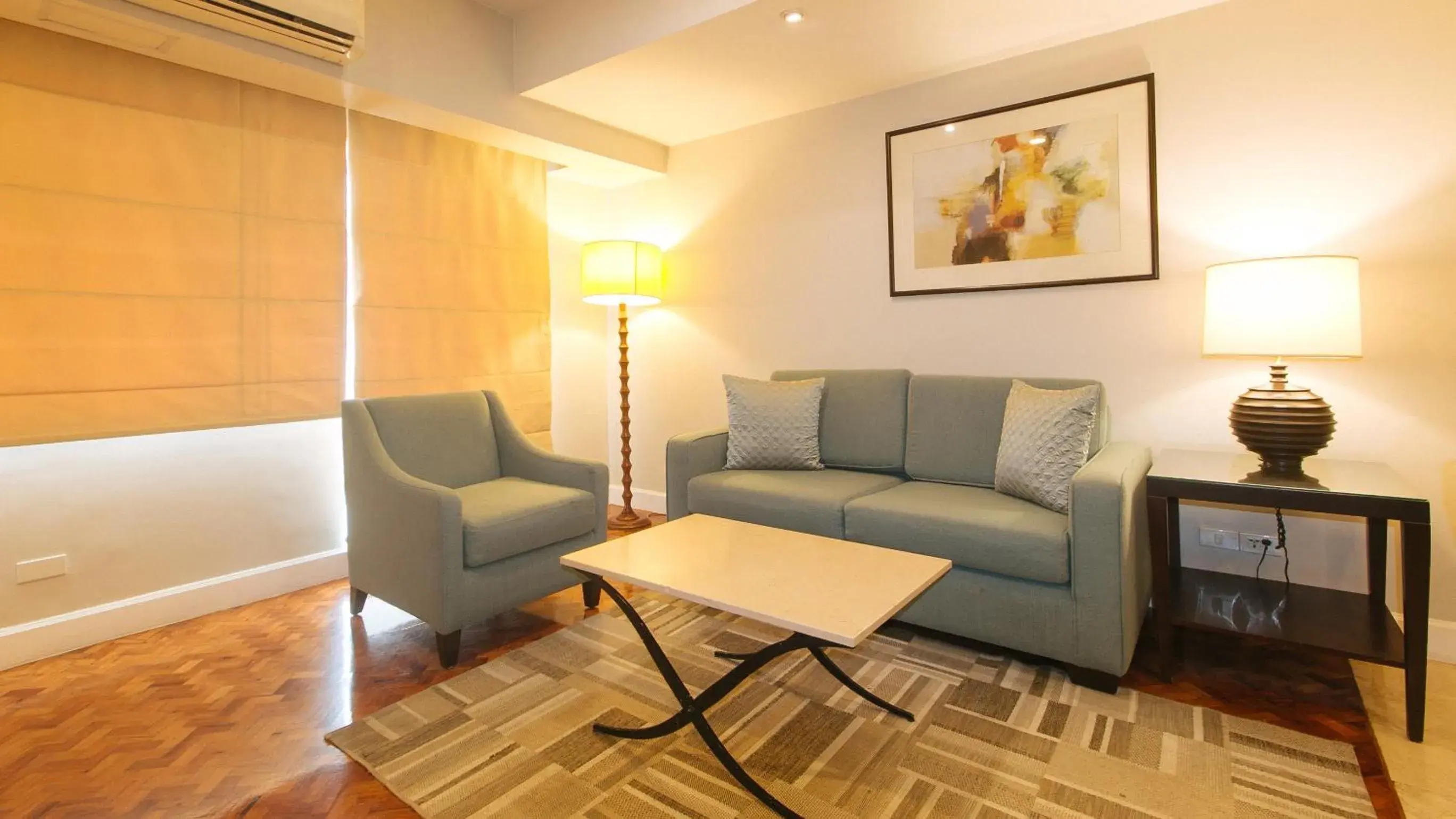 Seating Area in RedDoorz Premium @ The Residences Olympia Makati
