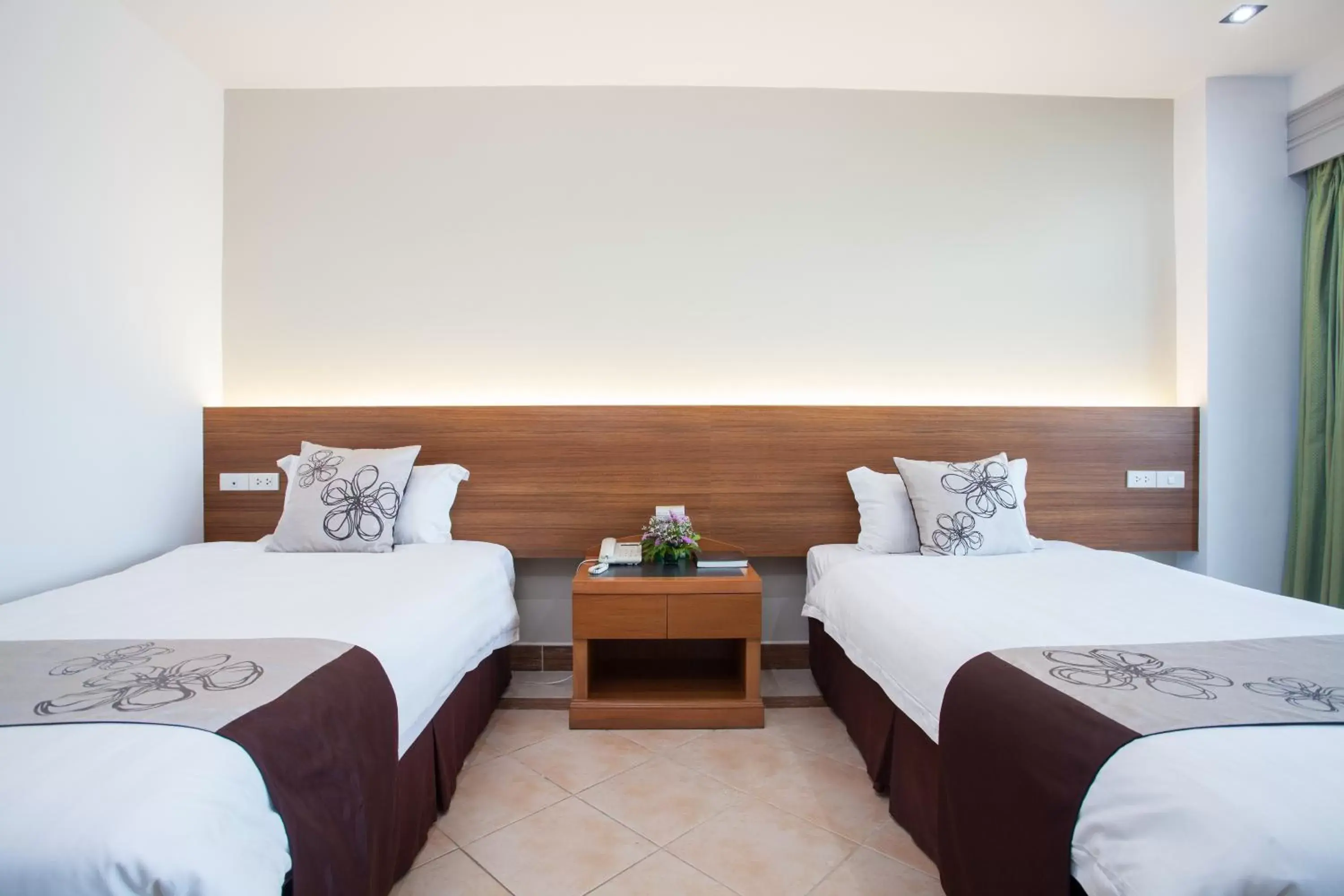 Bed in Diana Garden Resort - SHA Extra Plus