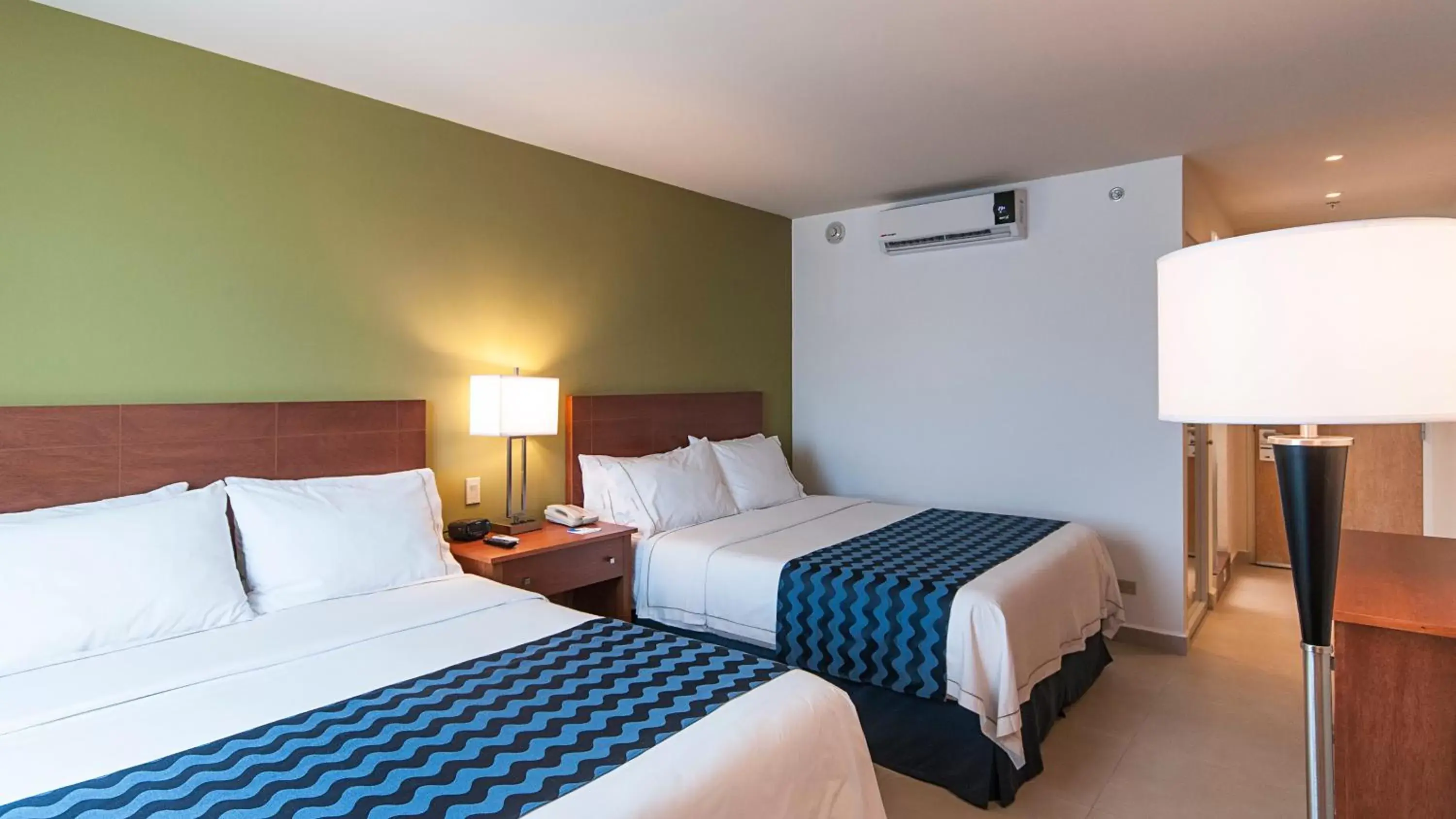 Photo of the whole room, Bed in Holiday Inn Express Cabo San Lucas by IHG Photo of the whole room, Bed in Holiday Inn Express Cabo San Lucas by IHG