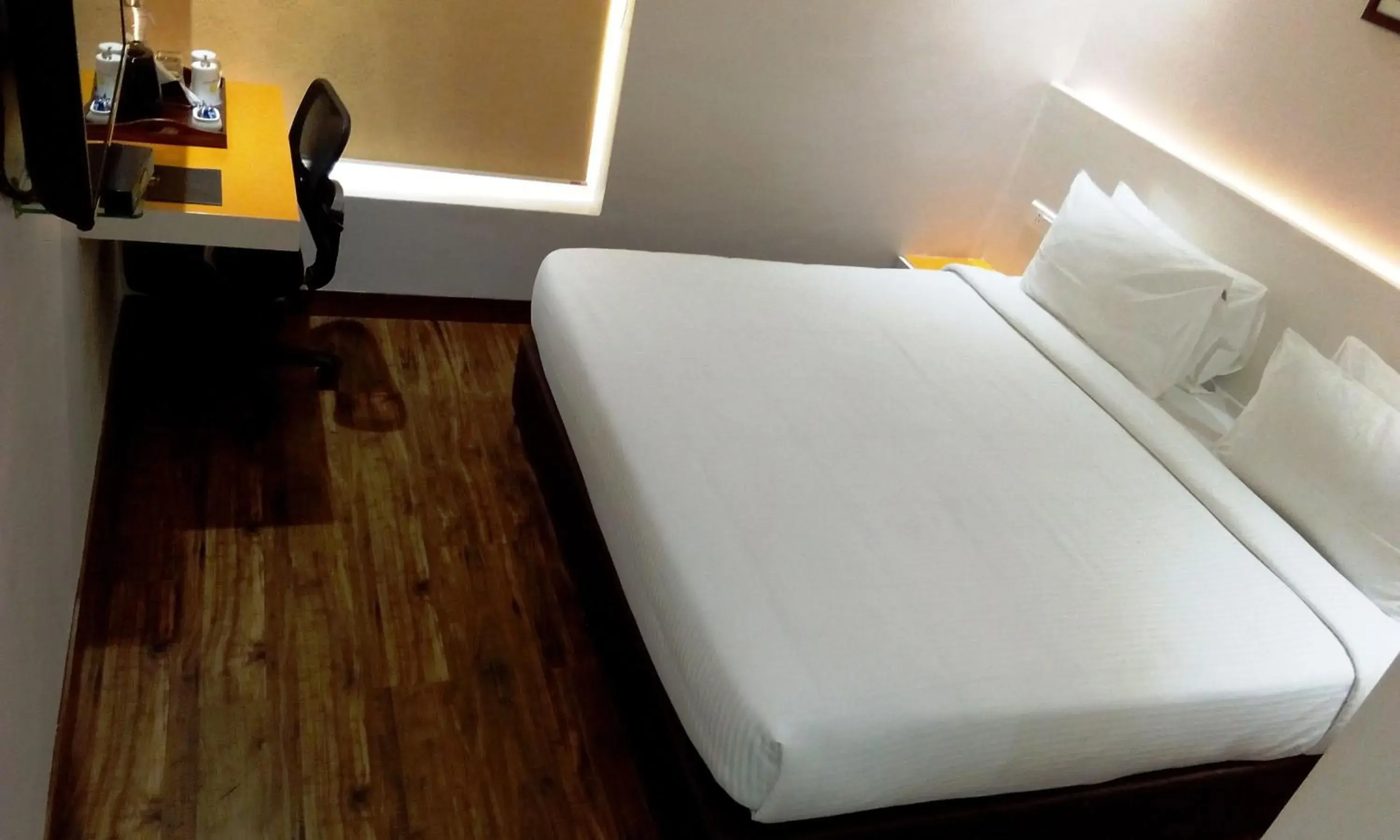 Photo of the whole room, Bed in Mango Hotels - Prangan