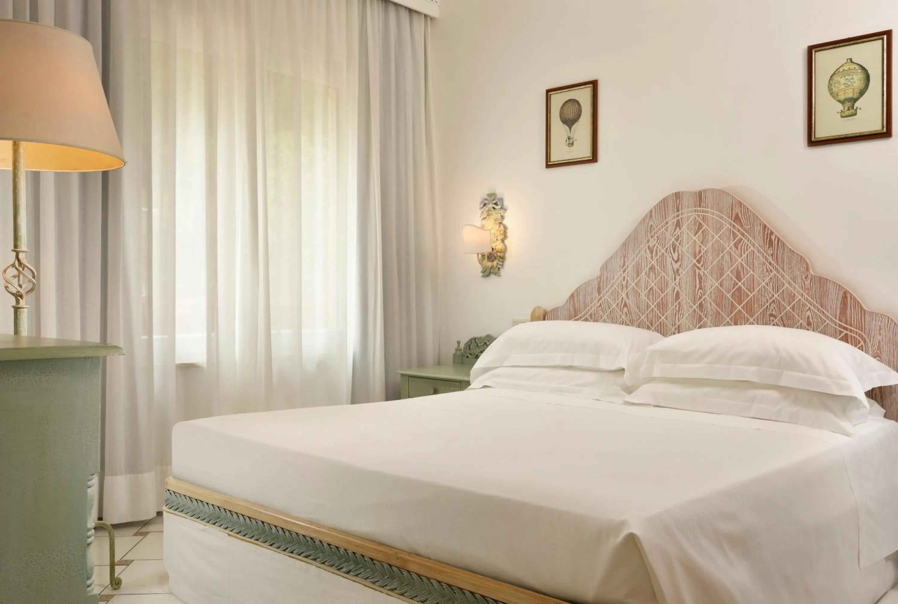 Bed in Golf Hotel Punta Ala