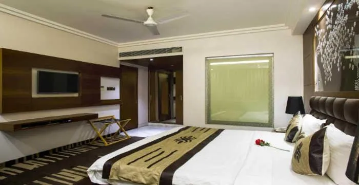Bedroom, Bed in Hotel JRD Exotica-Business Hotel