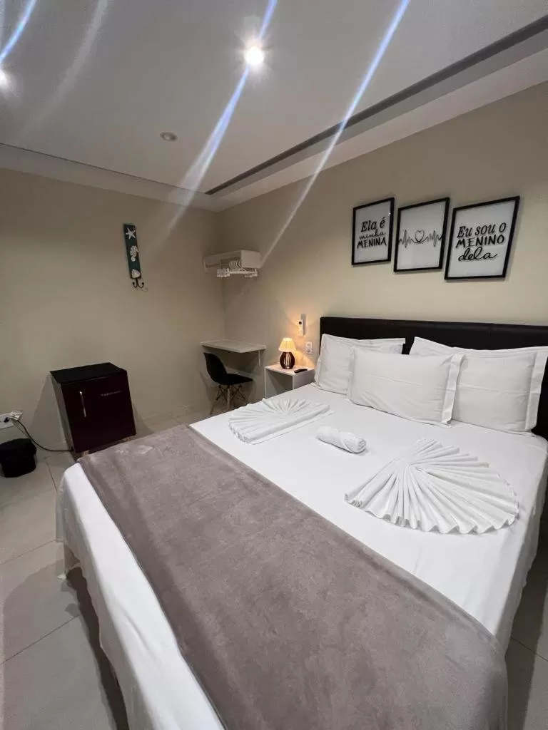 Bed in Pousada Arraial Tropical