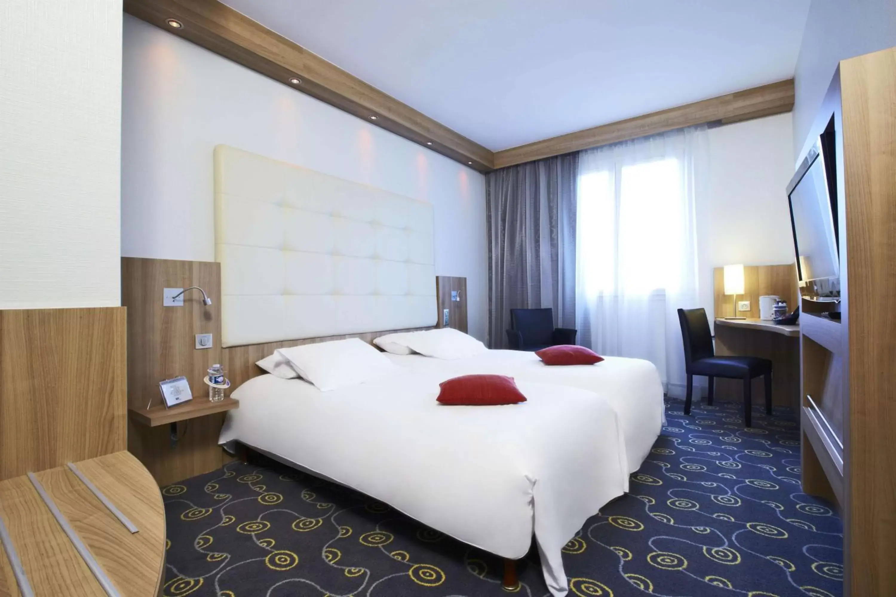 Photo of the whole room, Bed in Kyriad Hotel Tours Centre