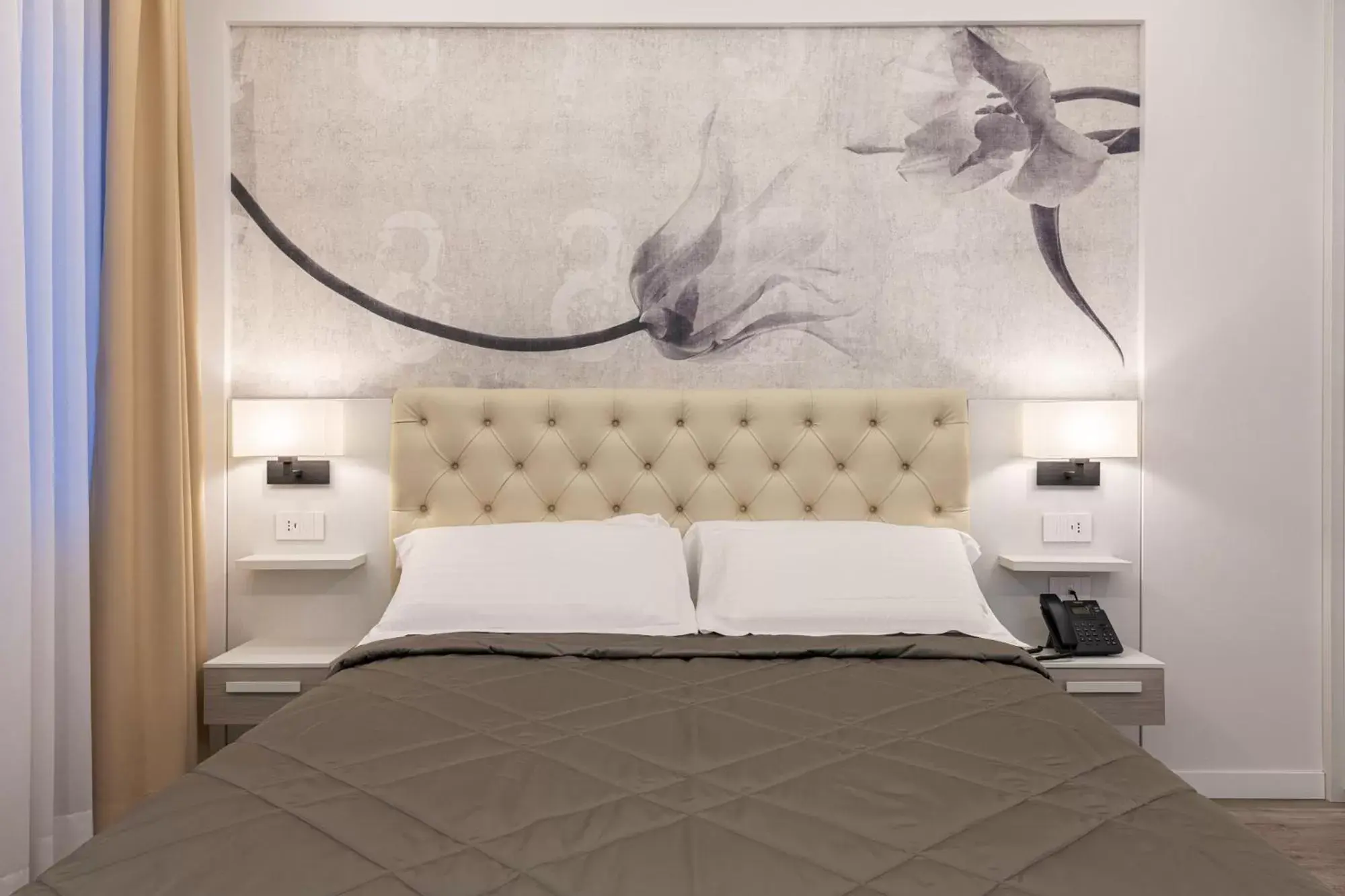 Bed in Petit Hotel