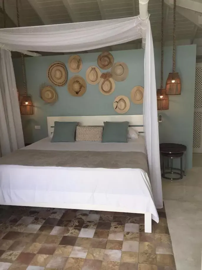 Bed in Mahona Boutique Hotel