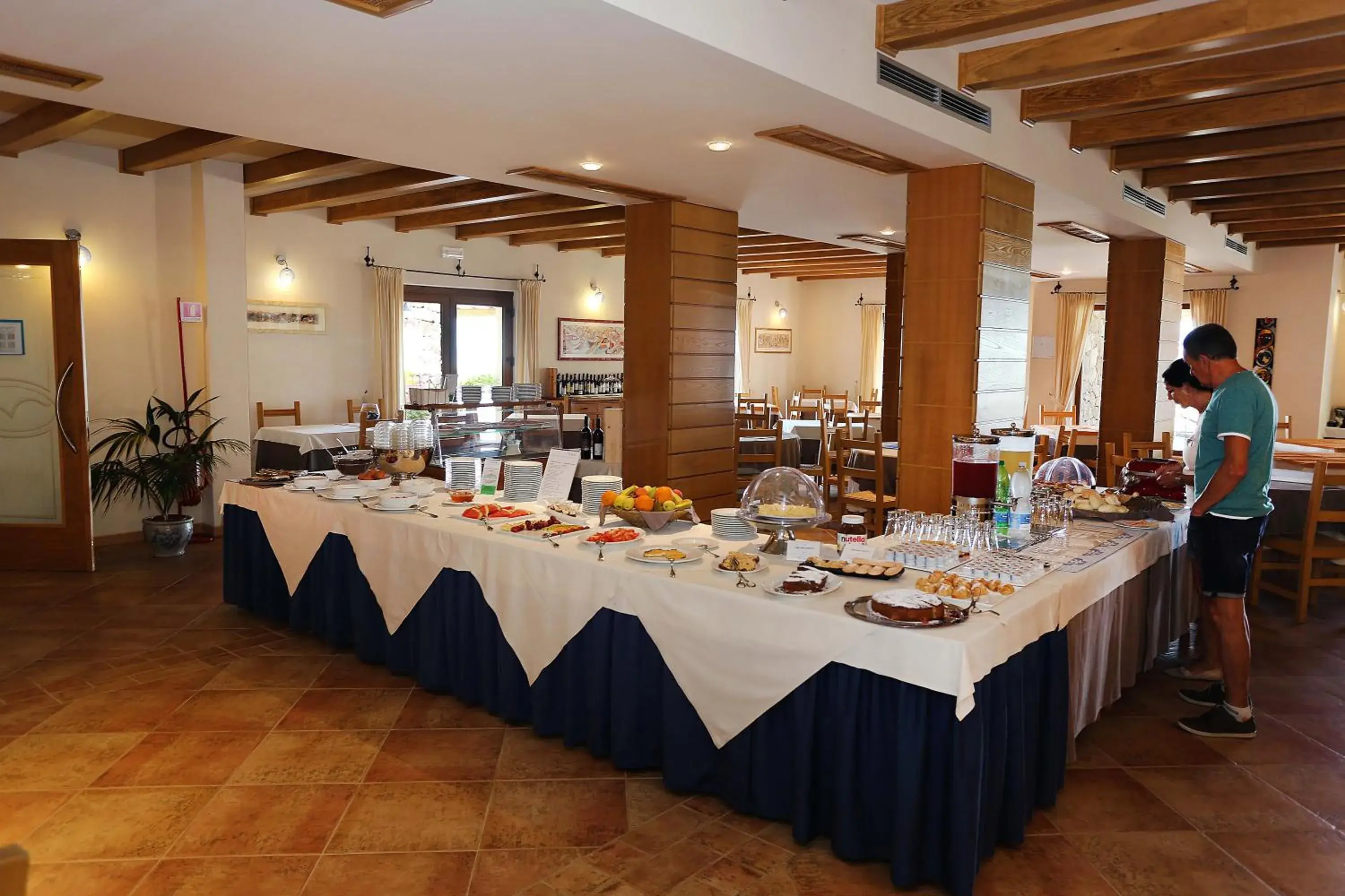 Restaurant/Places to Eat in Hotel Villa Gustui Maris