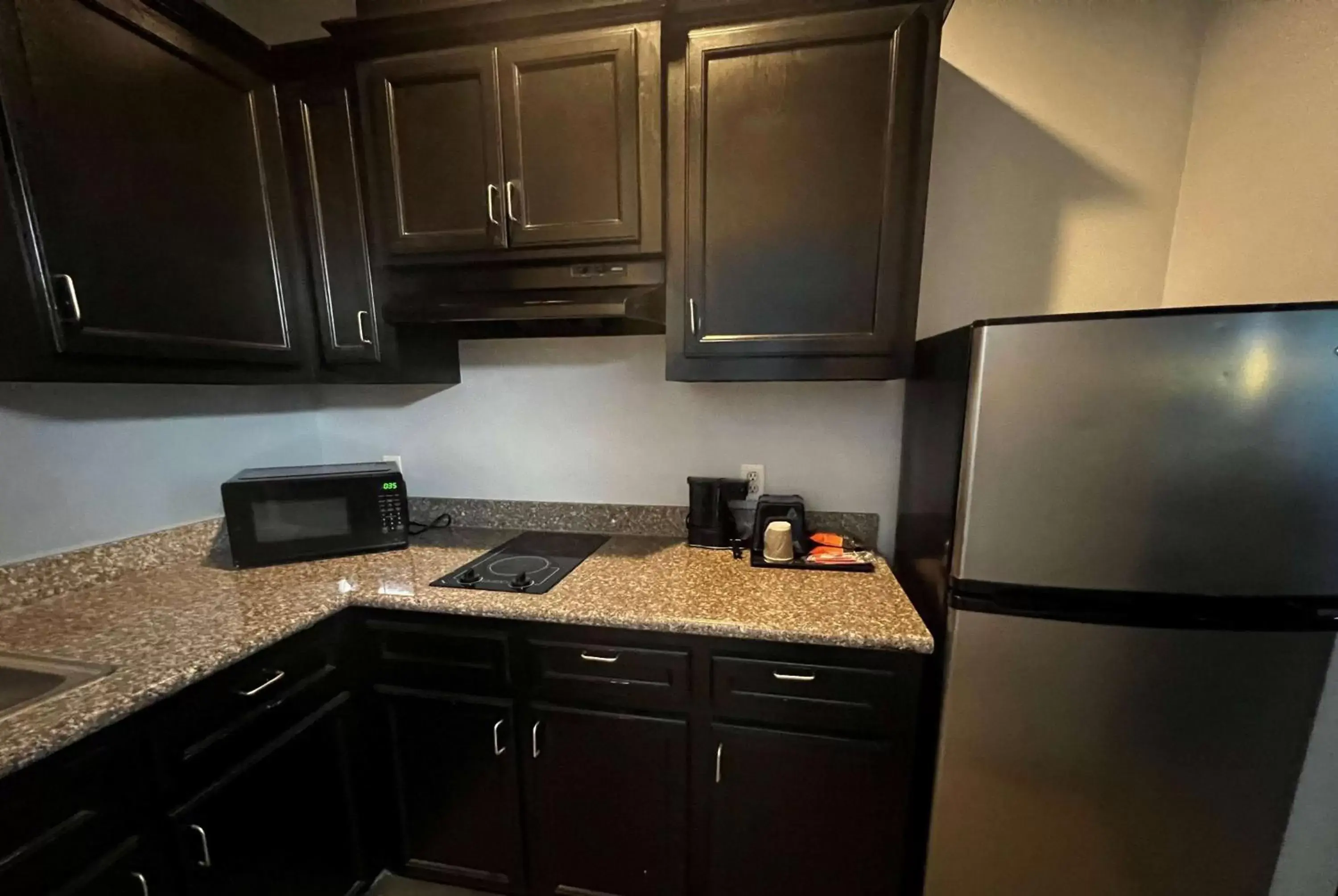 Photo of the whole room, Kitchen/Kitchenette in Super 8 by Wyndham Houston North I-45