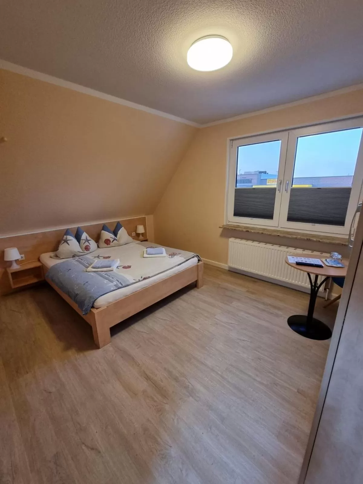 Photo of the whole room, Bed in Hotel Pension Nordseewelle