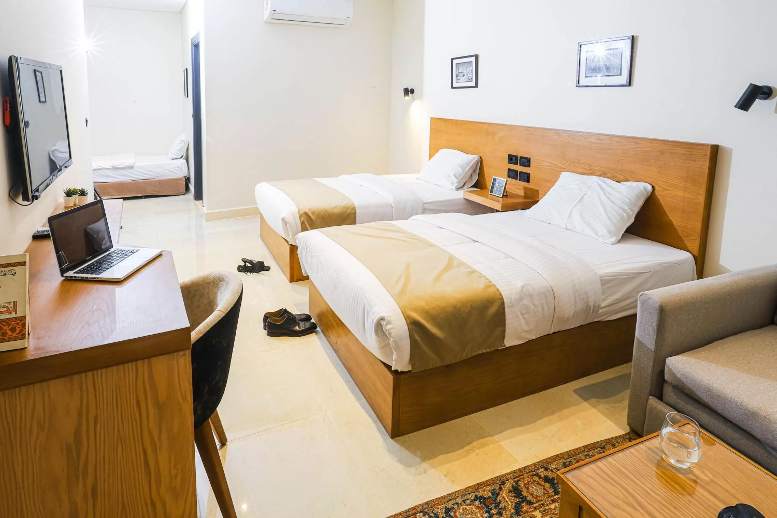 Photo of the whole room, Bed in NewCity Hotel & Suites