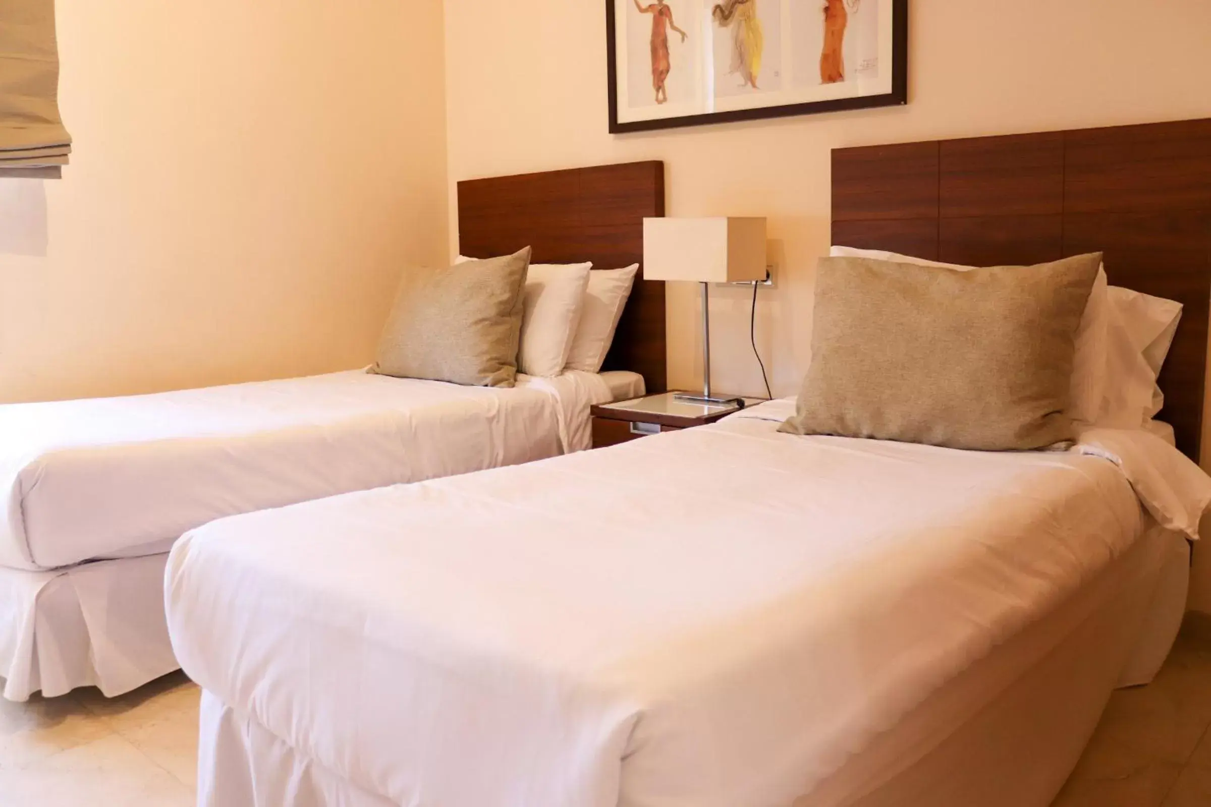 Bed in Ramada Hotel & Suites by Wyndham Costa del Sol