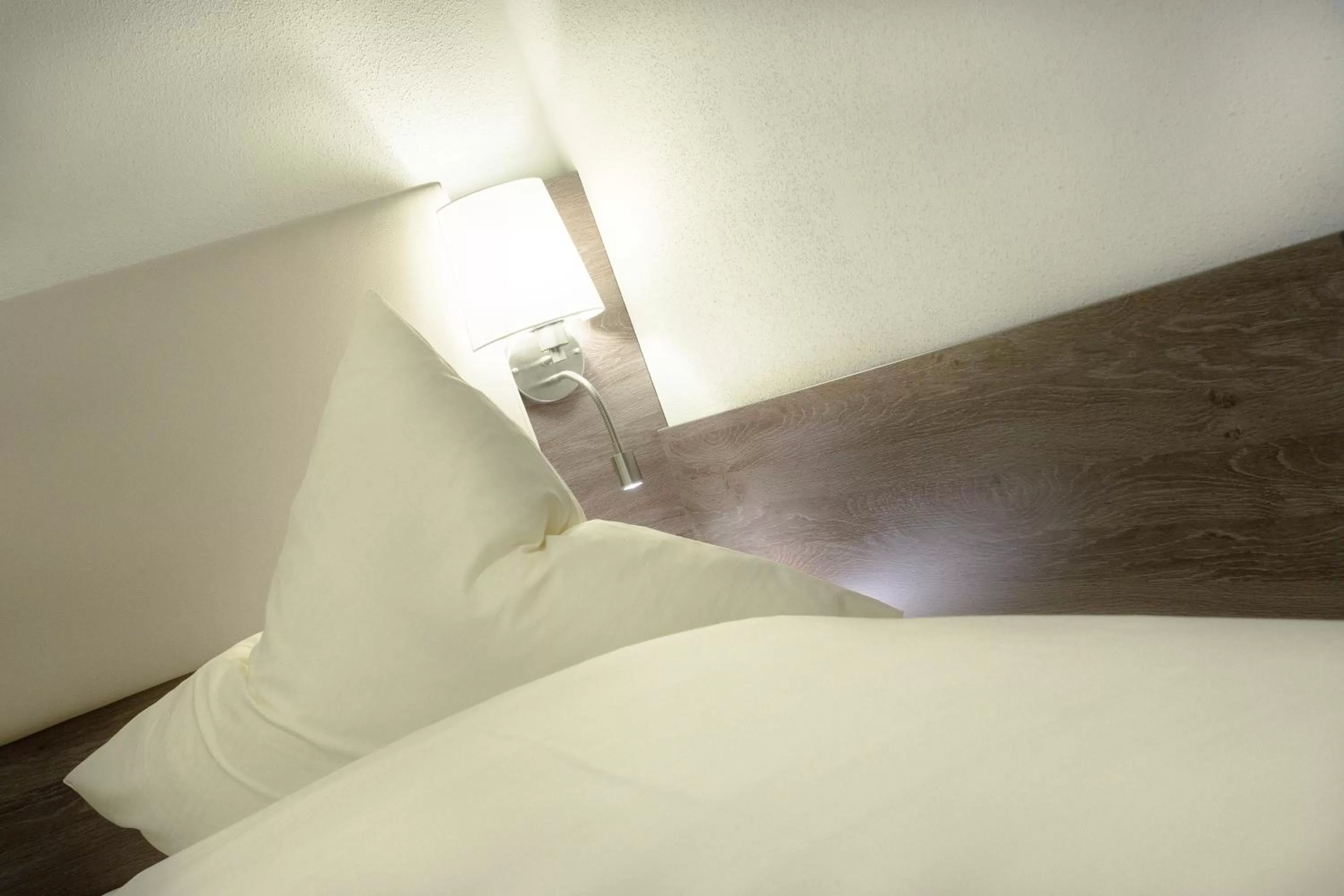 Bed in CityApart Hotel