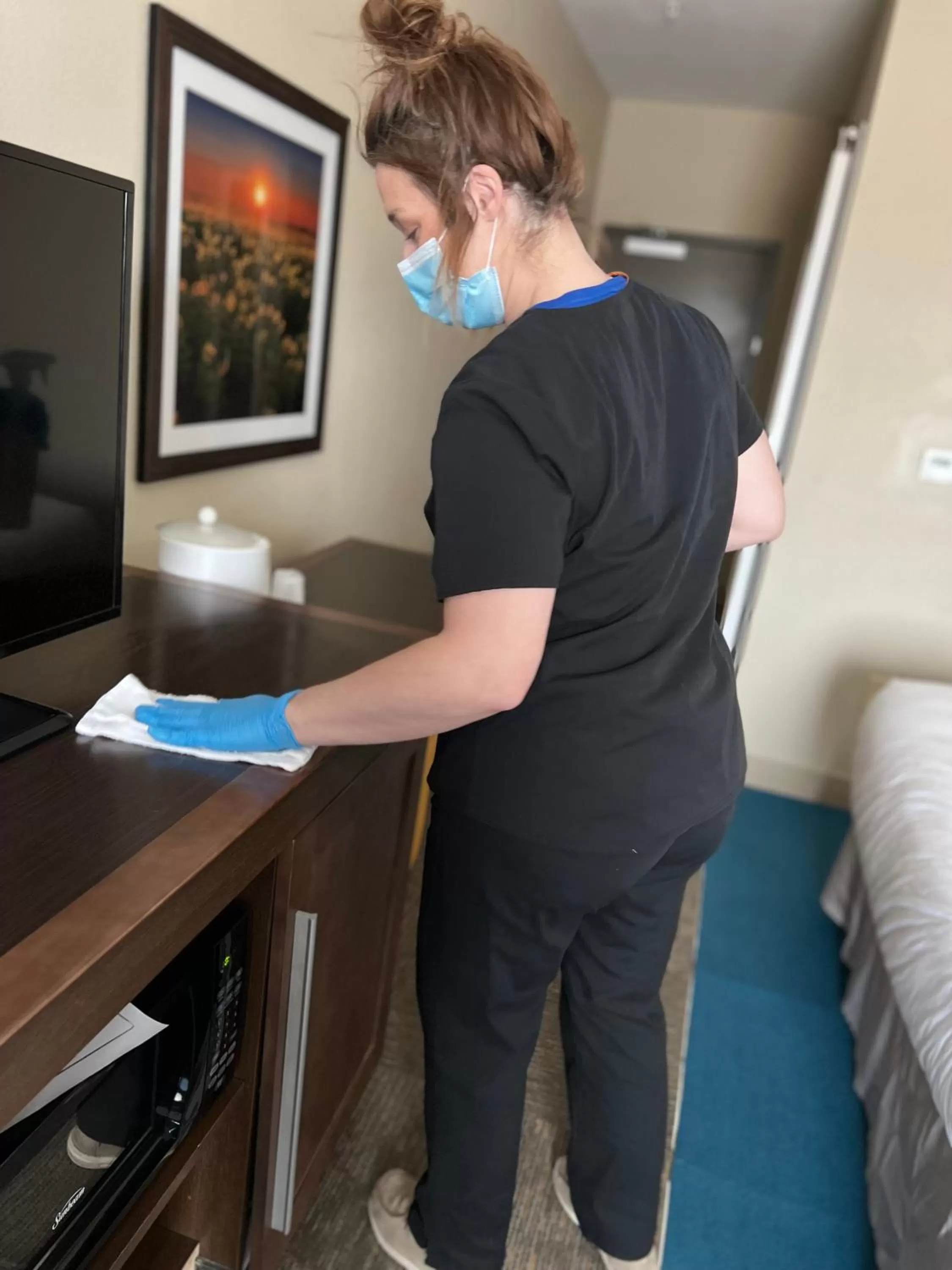 People in Flag Point Inn and Suites Pratt by FairBridge