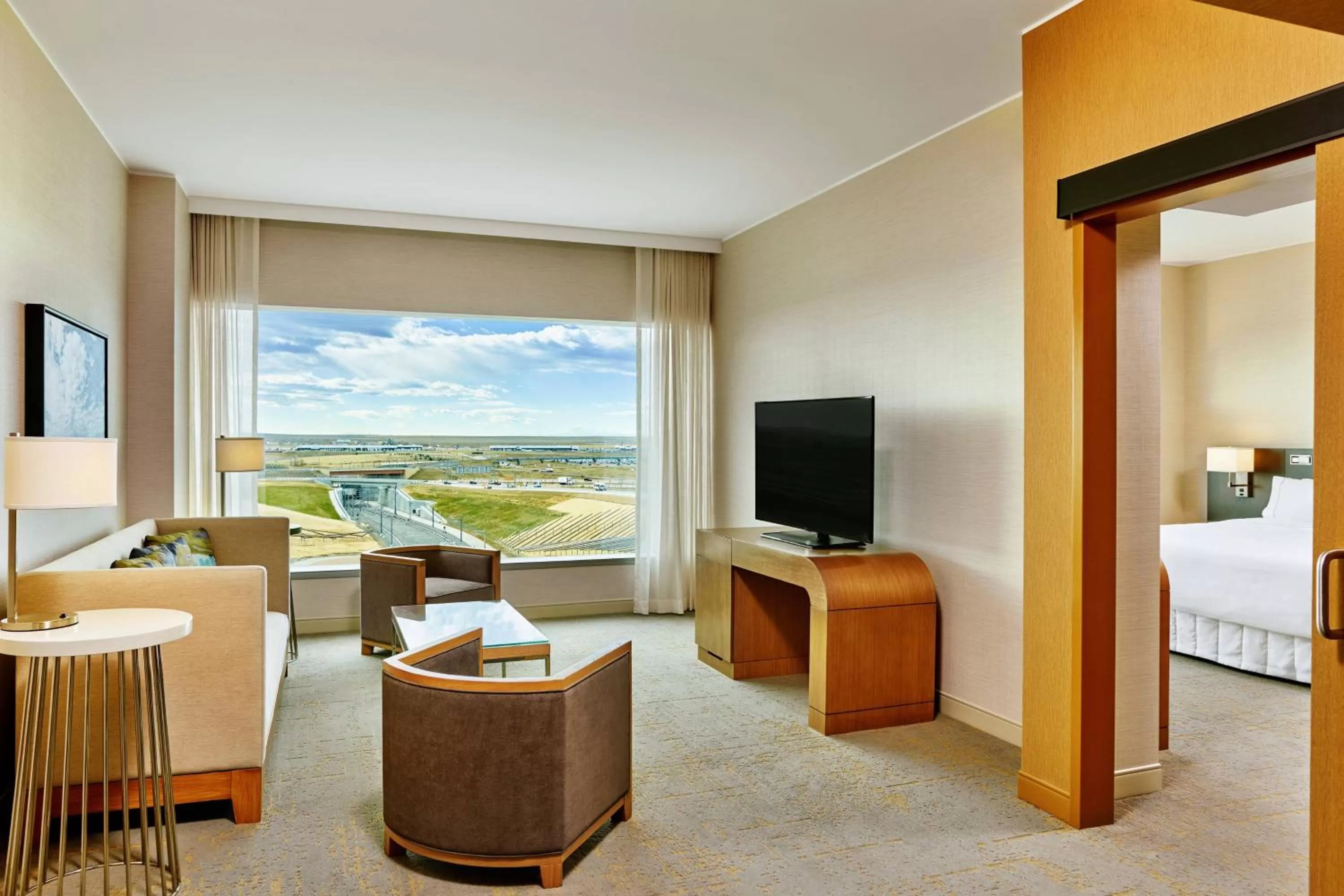 Living room, Bed in The Westin Denver International Airport