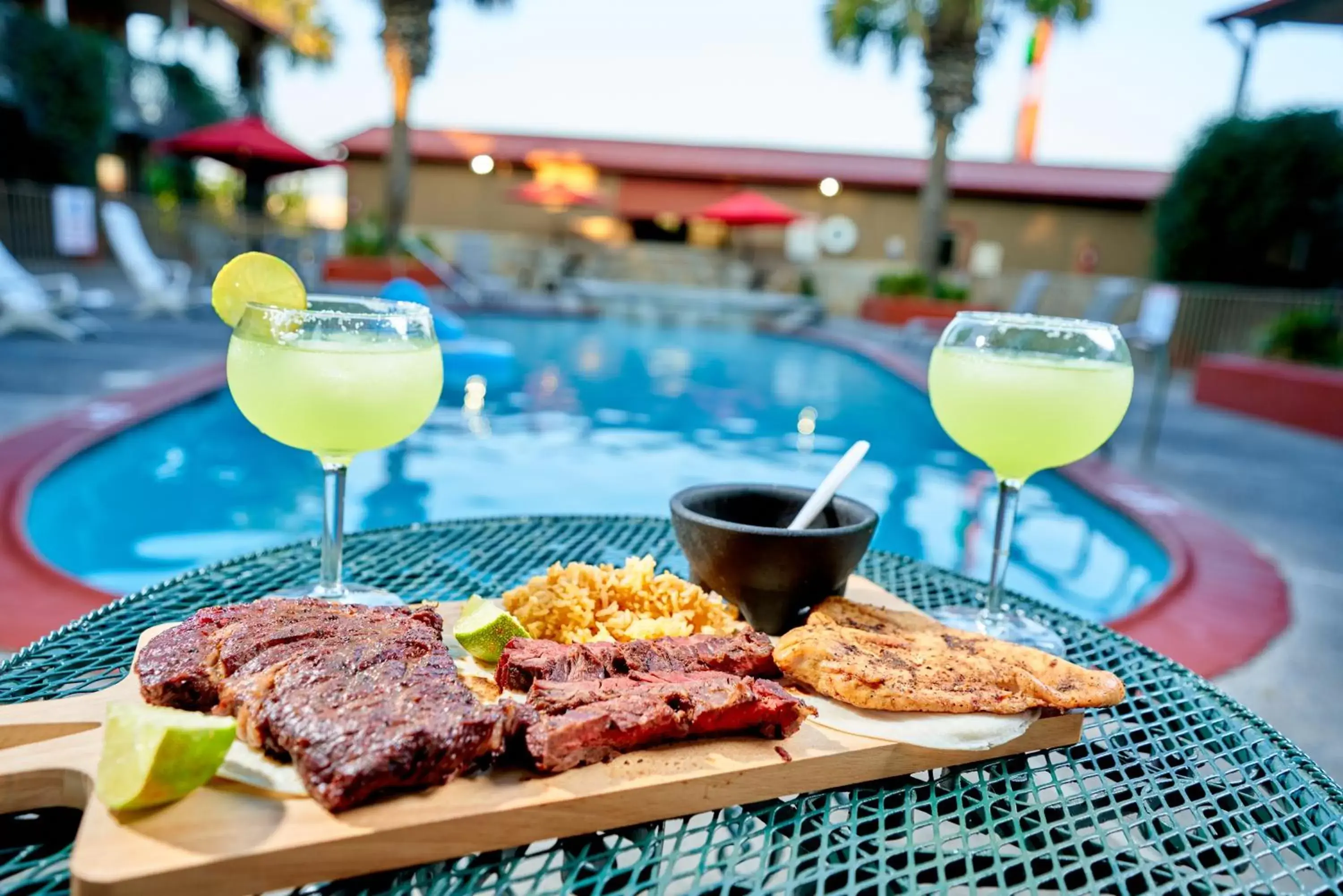 Swimming Pool in Family Garden Inn & Suites