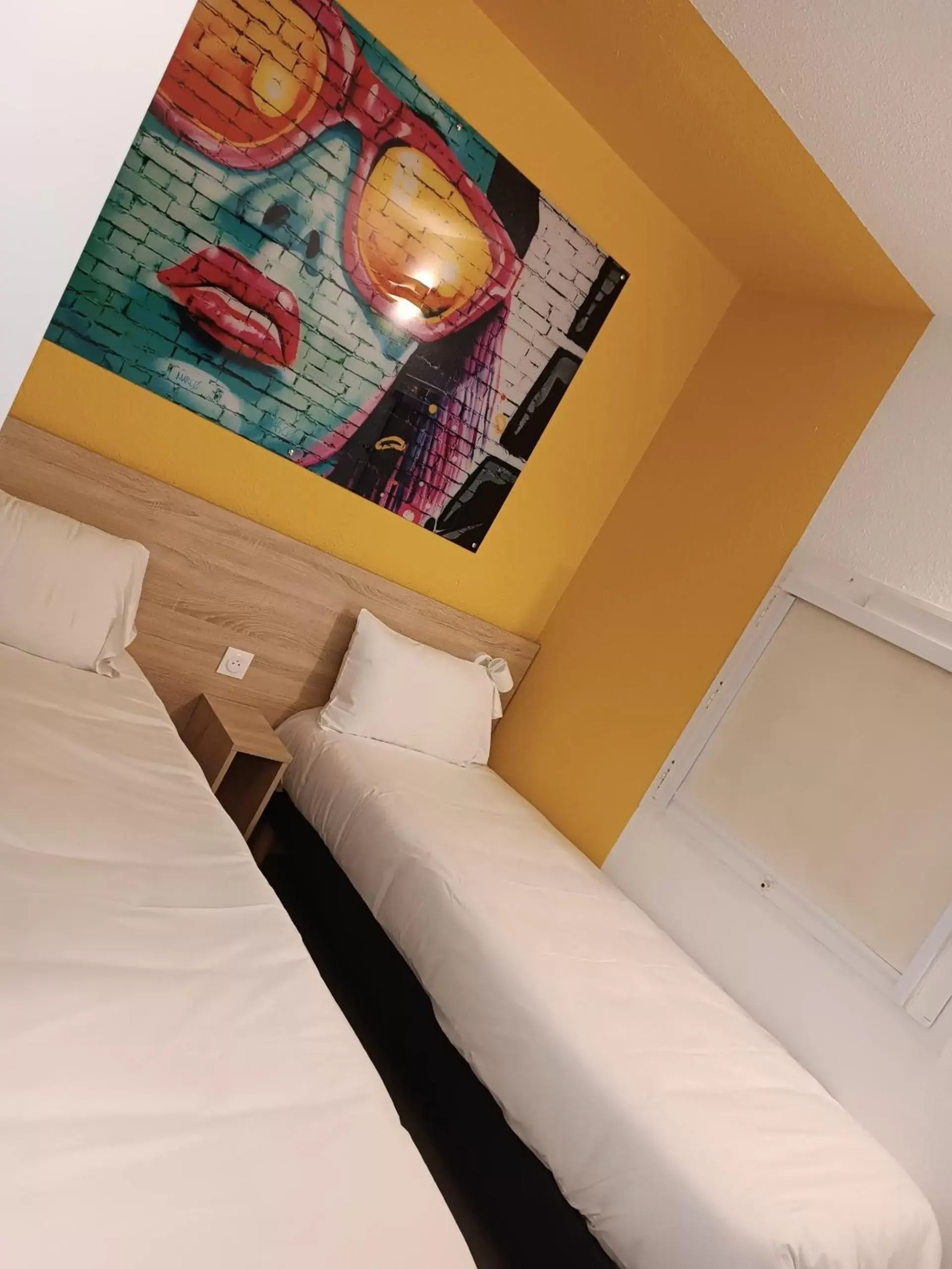 Bed in Kyriad Direct Moulins Sud - Yzeure