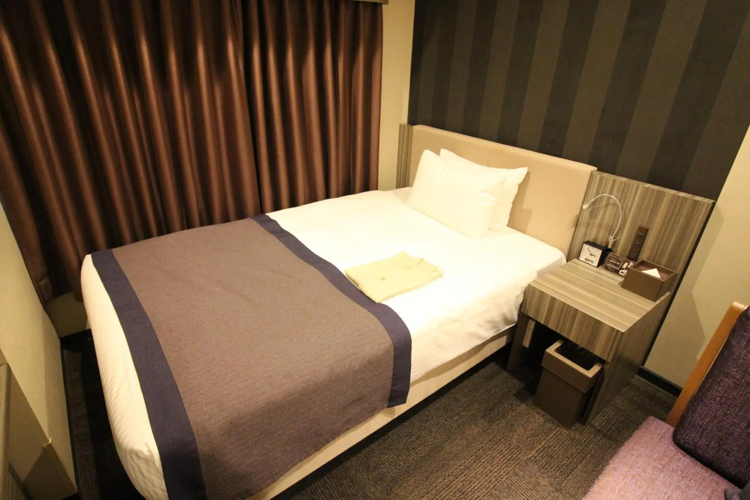Bed in Almont Inn Tokyo Nihonbashi