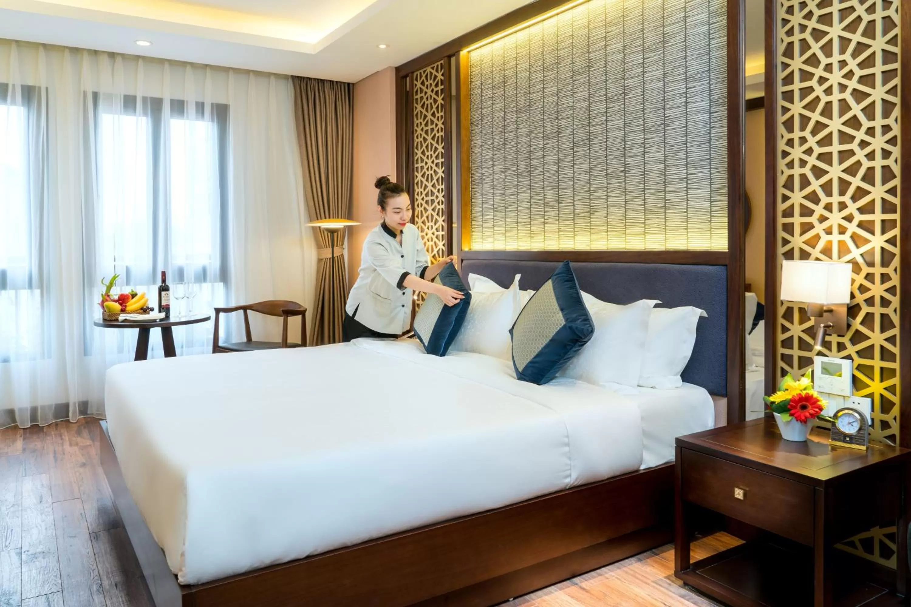 Bed in Conifer Grand Hotel