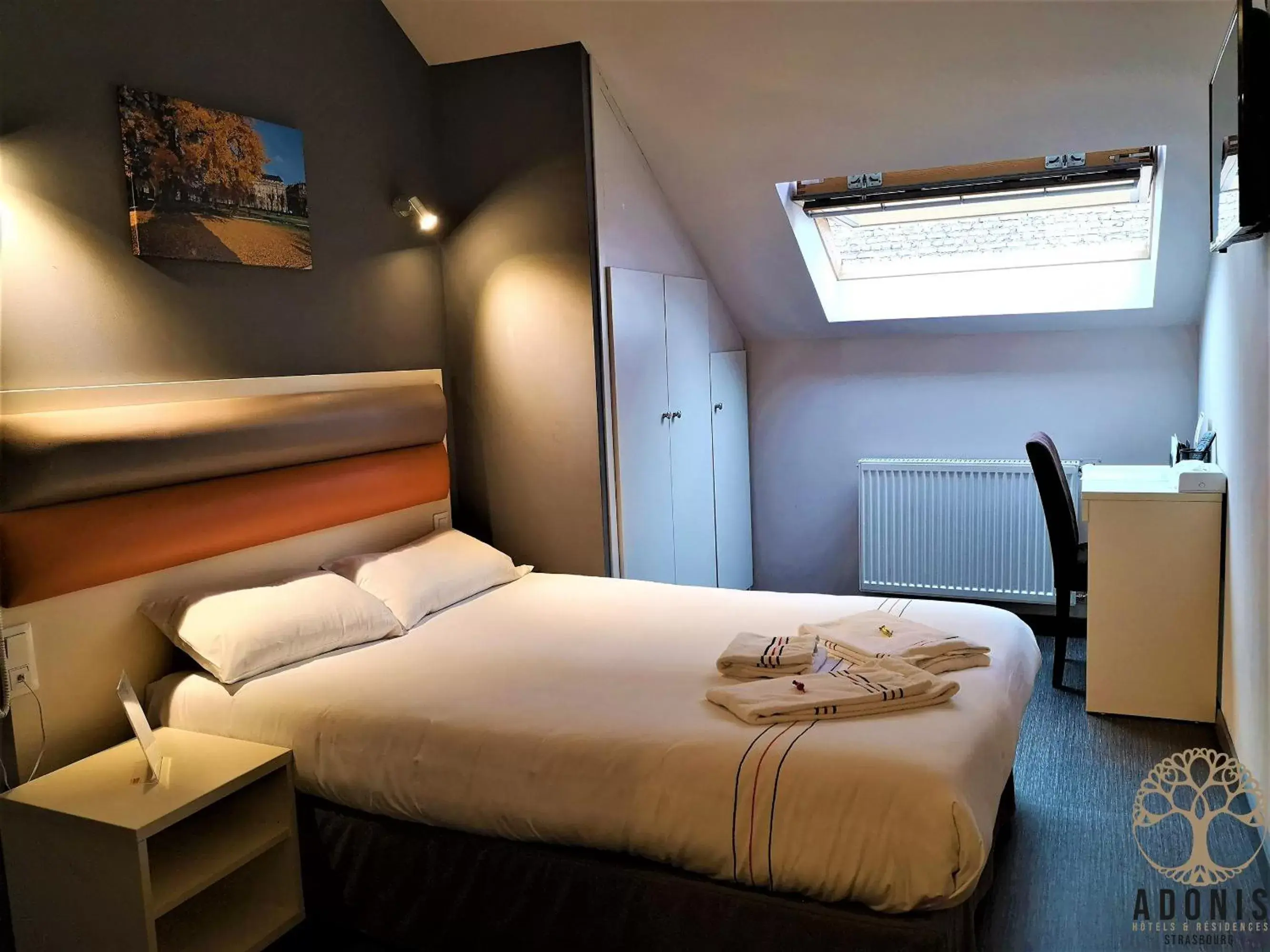 Photo of the whole room, Bed in Adonis Hotel Strasbourg
