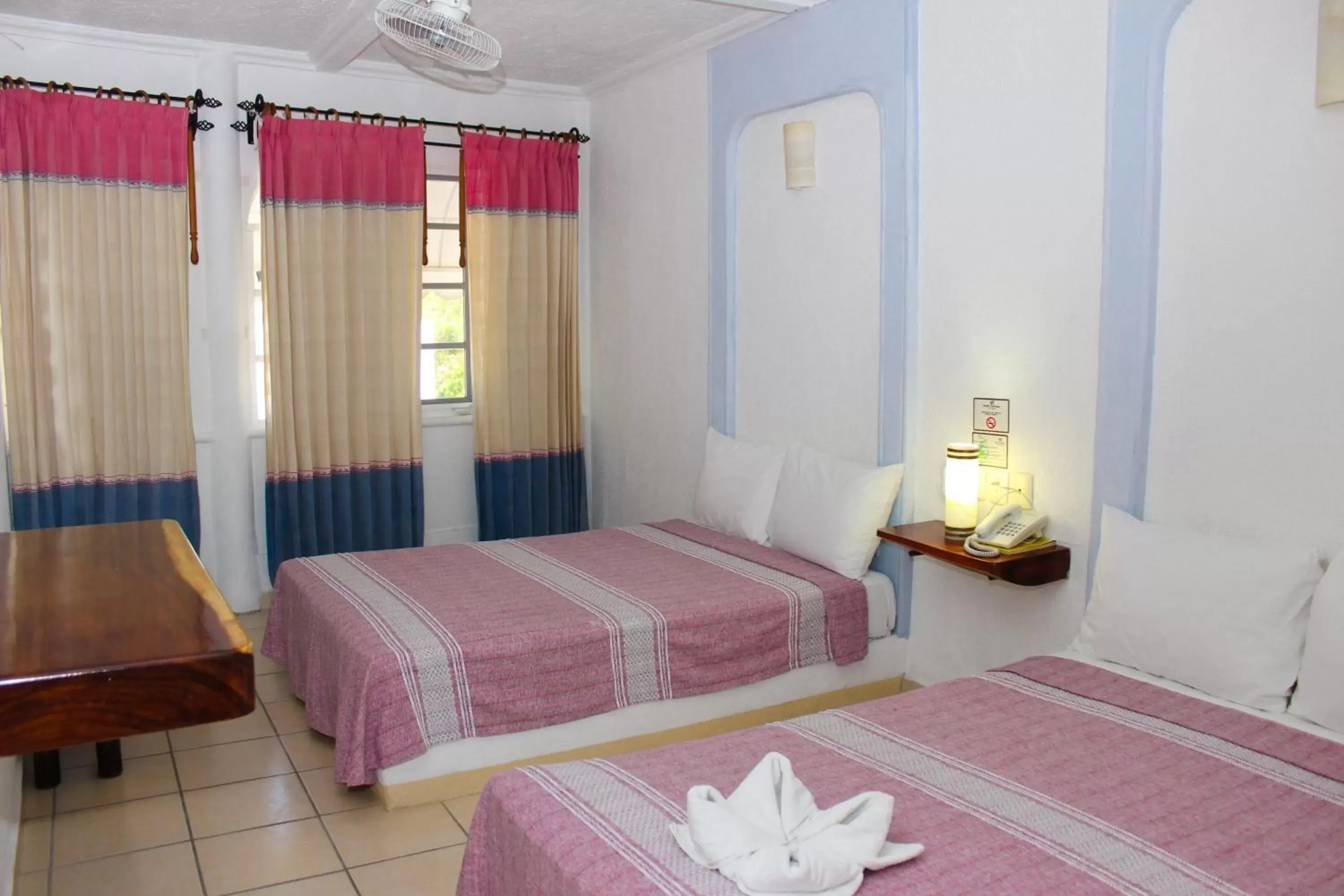 Bed in Hotel Careyes Puerto Escondido