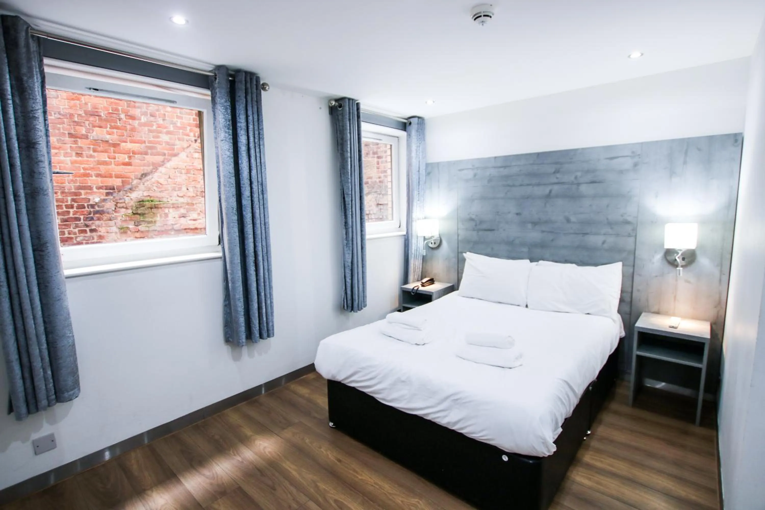 Bed in Brunswick Merchant City Hotel