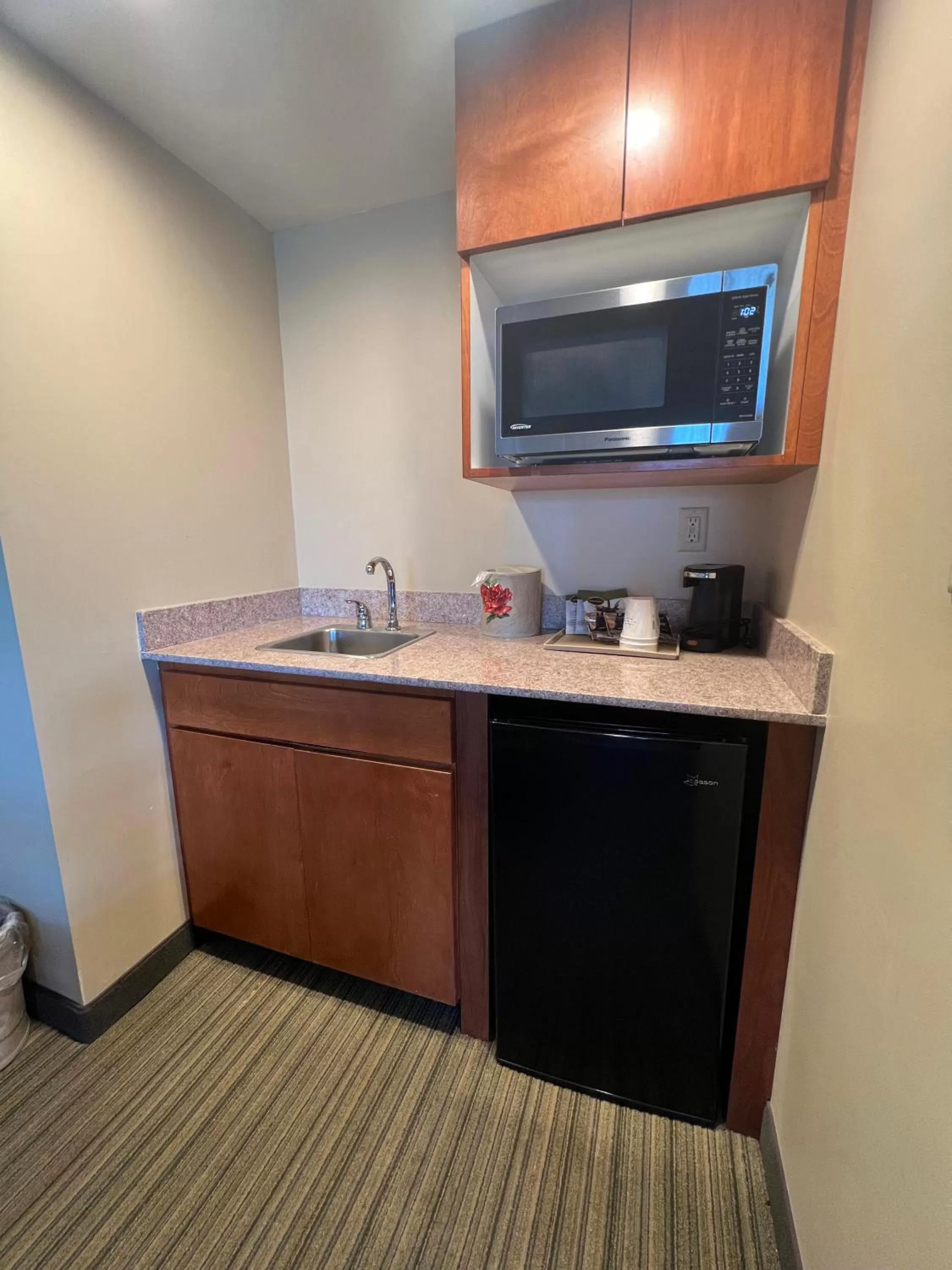 Kitchen or kitchenette in Wingate by Wyndham Coon Rapids